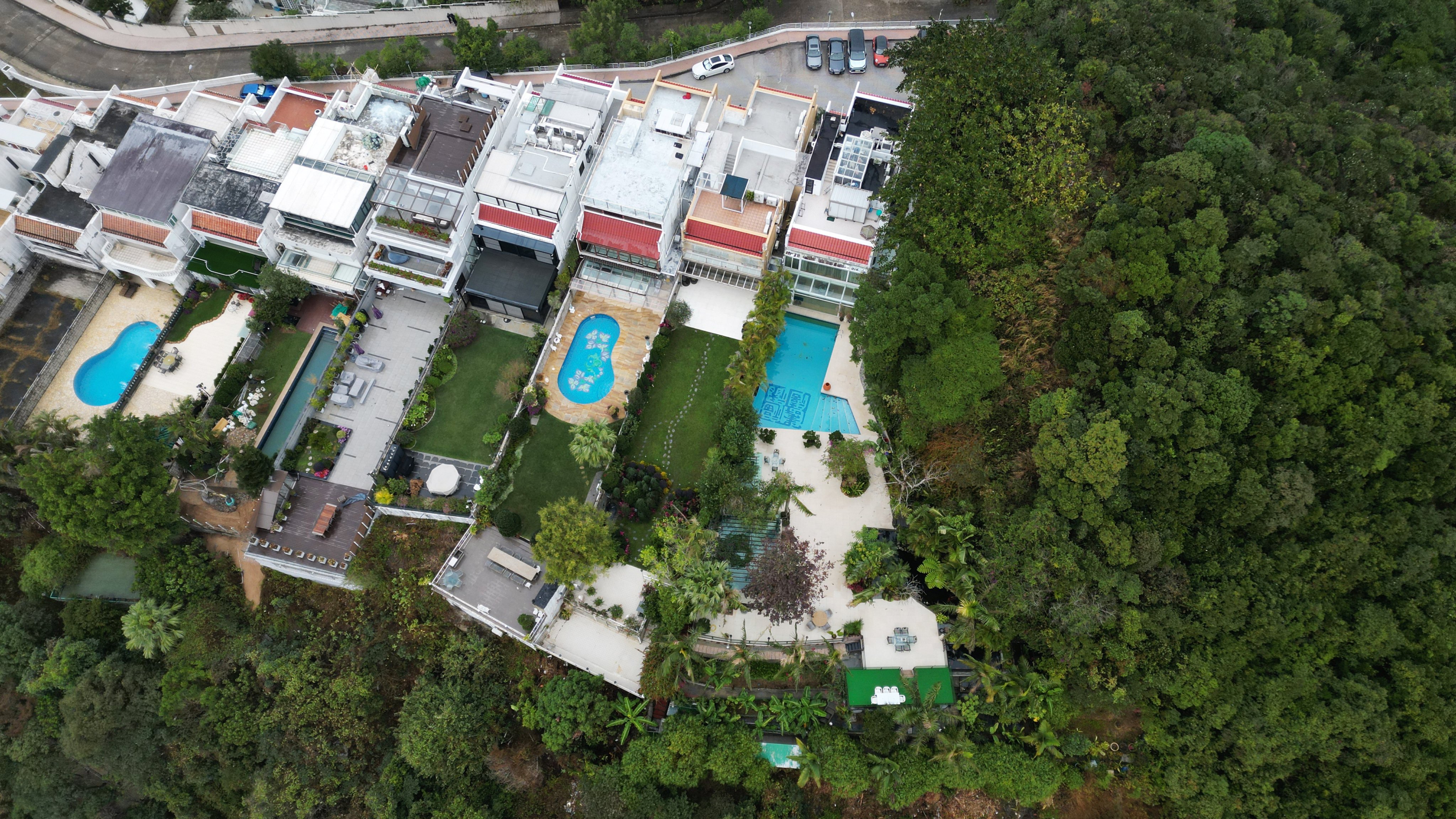 An aerial view of Flamingo Garden Block B in Clear Water Bay, where the Post has uncovered suspected unauthorised structures, seen on January 23. The prevalence of illegal structures going noticed but unpunished risks undermining faith in the rule of law in Hong Kong. Photo: May Tse