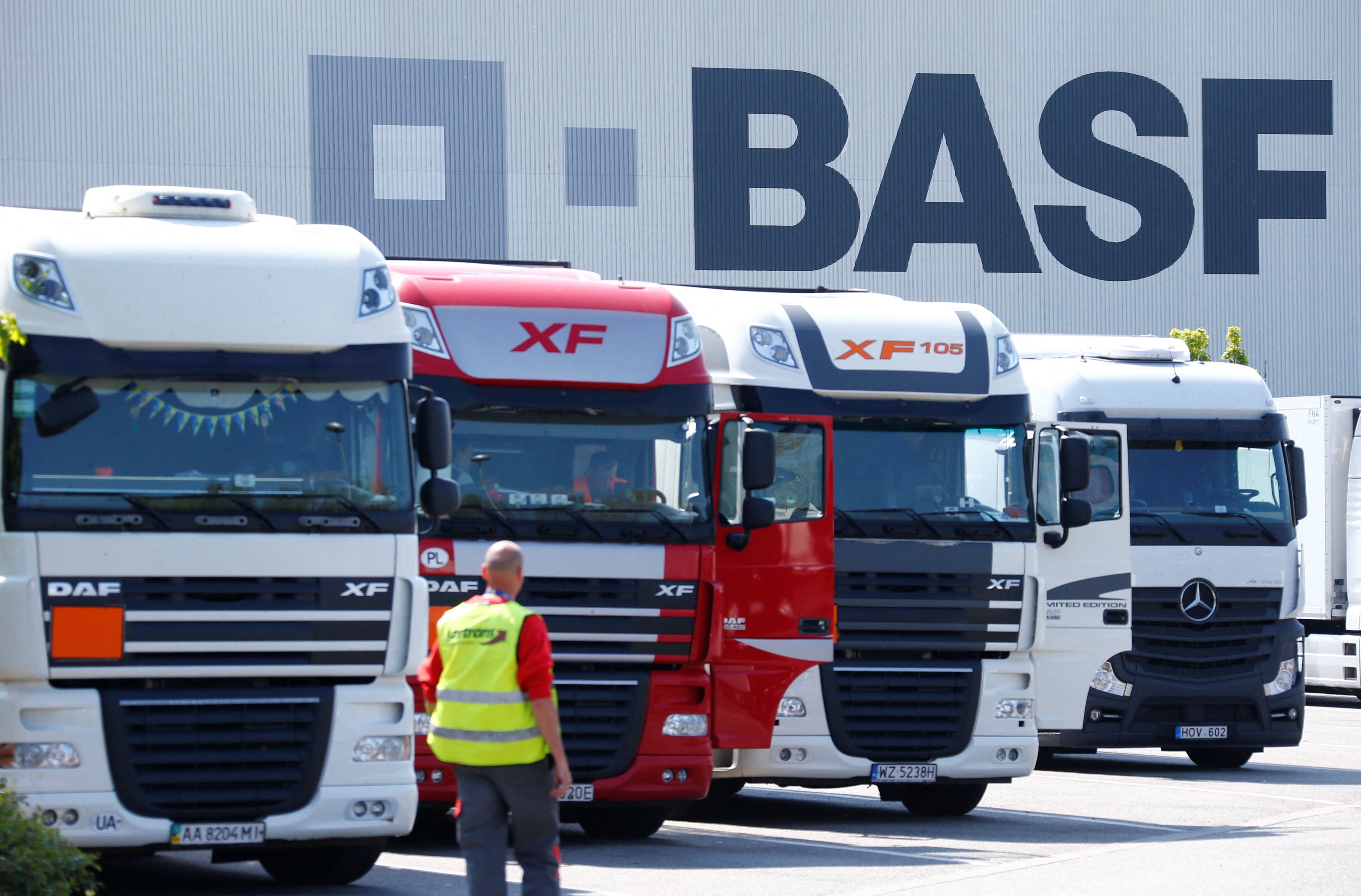 Trucks line the front of a warehouse of German chemical company BASF in Ludwigshafen. Photo: Reuters