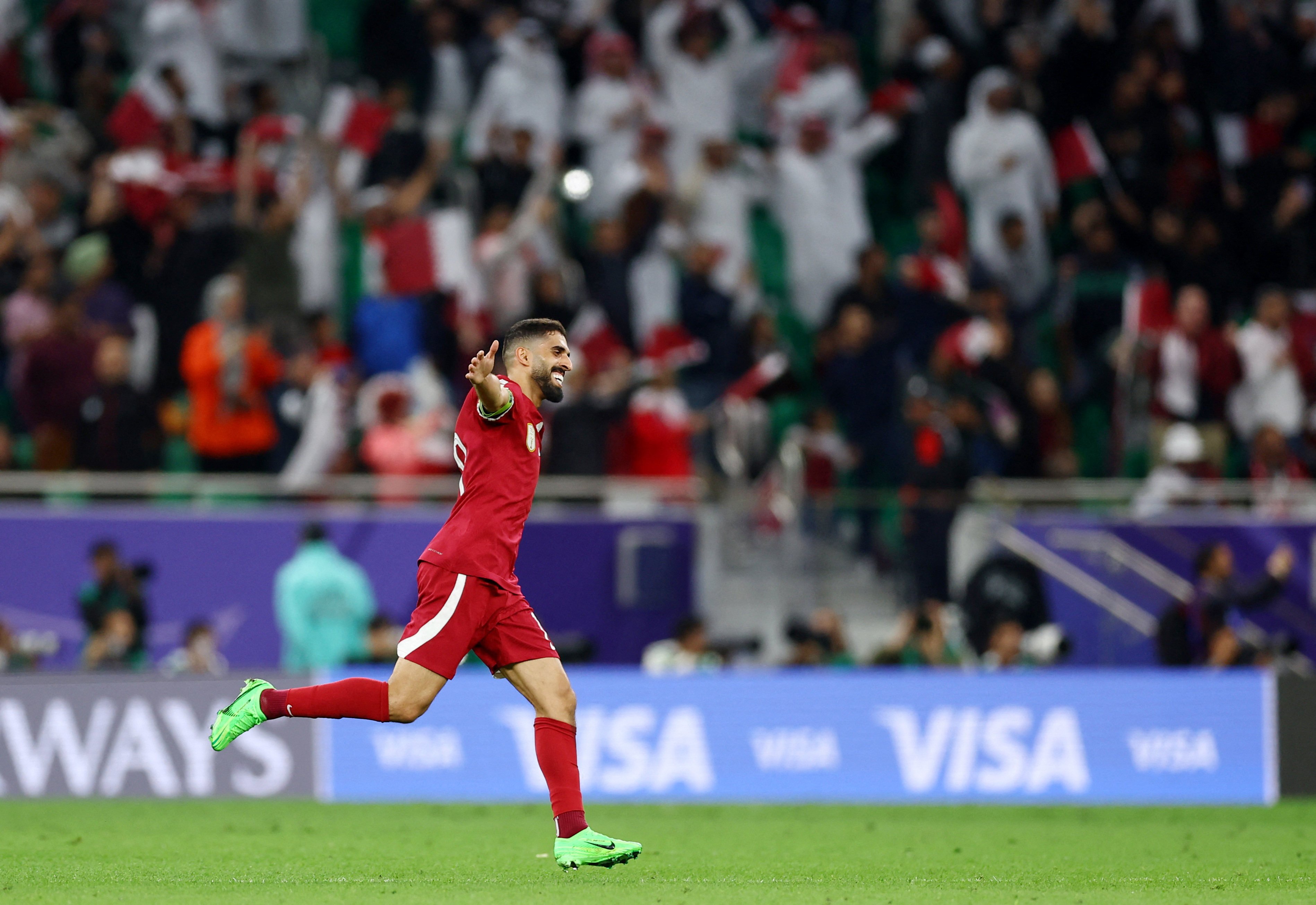 Qatar’s Hassan Al Haydos celebrates his side’s Asian Cup semi-final win over Iran. Photo: Reuters