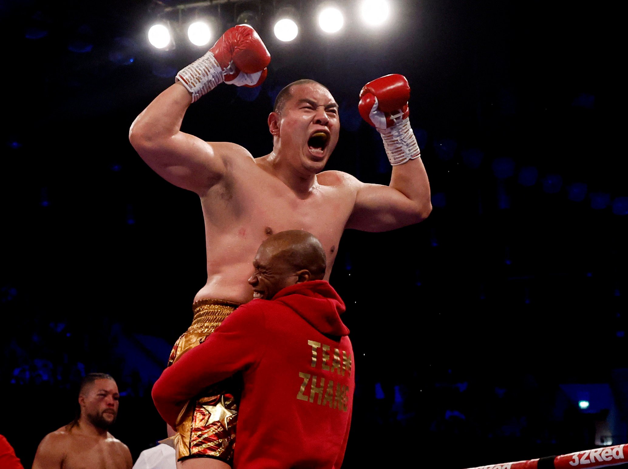  Zhang Zhilei celebrates beating Joe Joyce at the  Copper Box Arena in London on April 15, 2023. Photo: Reuters