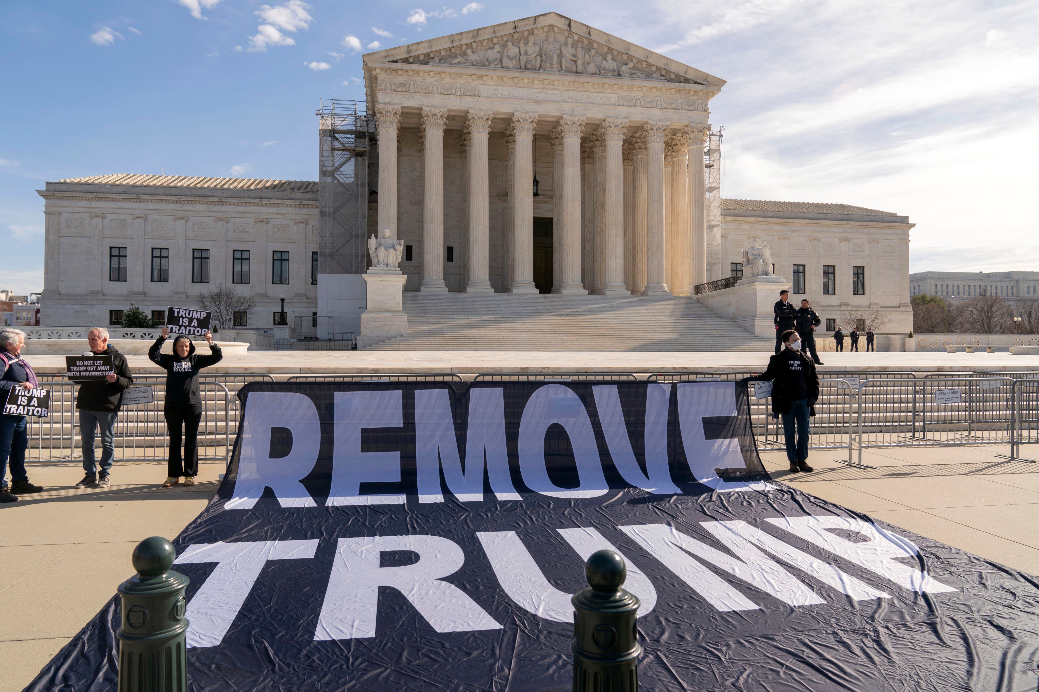 Protesters hold a banner outside the US Supreme Court in Washington on Thursday. Photo: AP