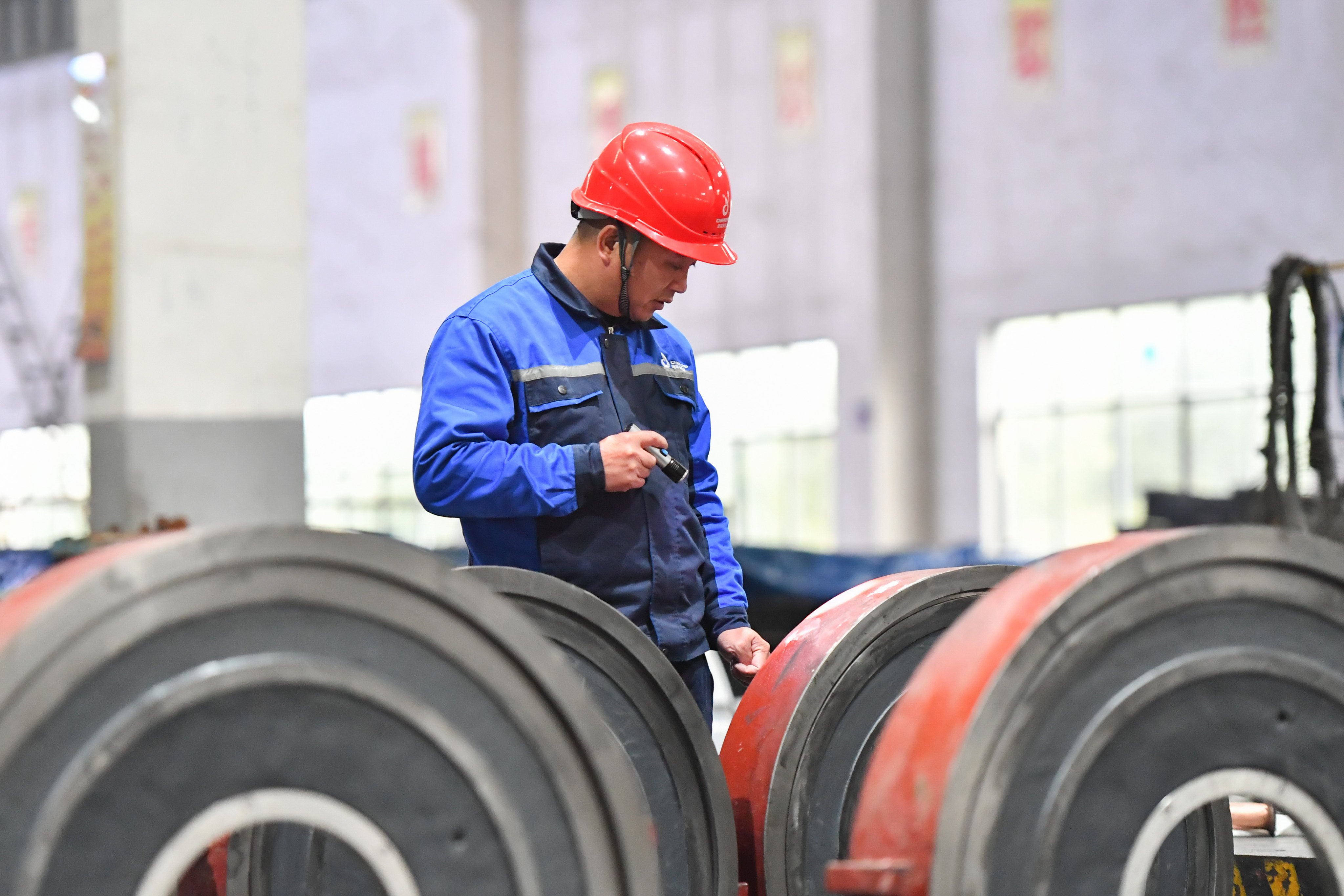 A staff member works at a pump factory in Liuyang City, in central China’s Hunan Province, on February 1, 2024. Photo: Xinhua