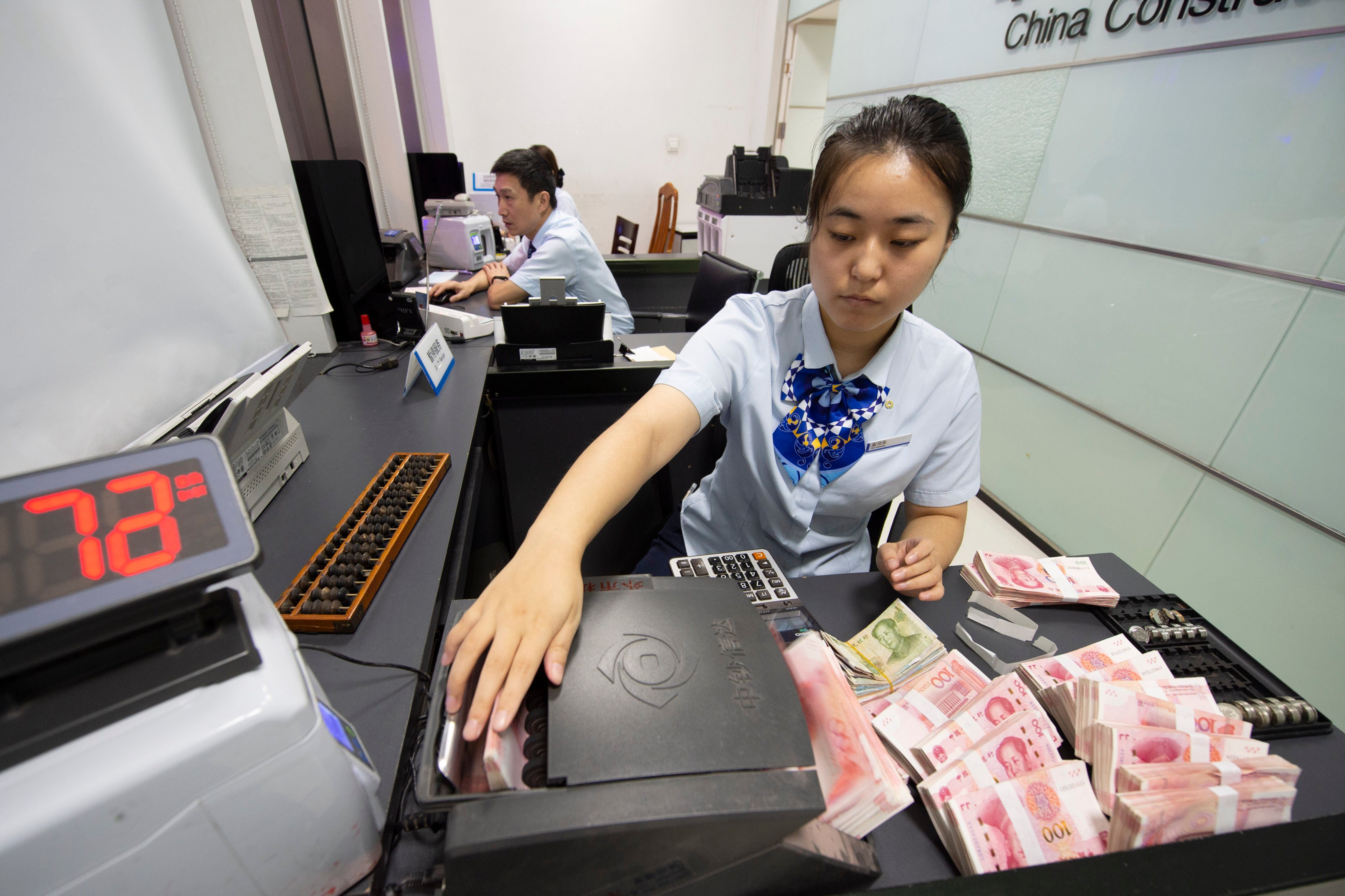 China’s yuan-denominated new loans reached a record high of 4.92 trillion yuan (US$684 billion) in January. Photo: Getty Images