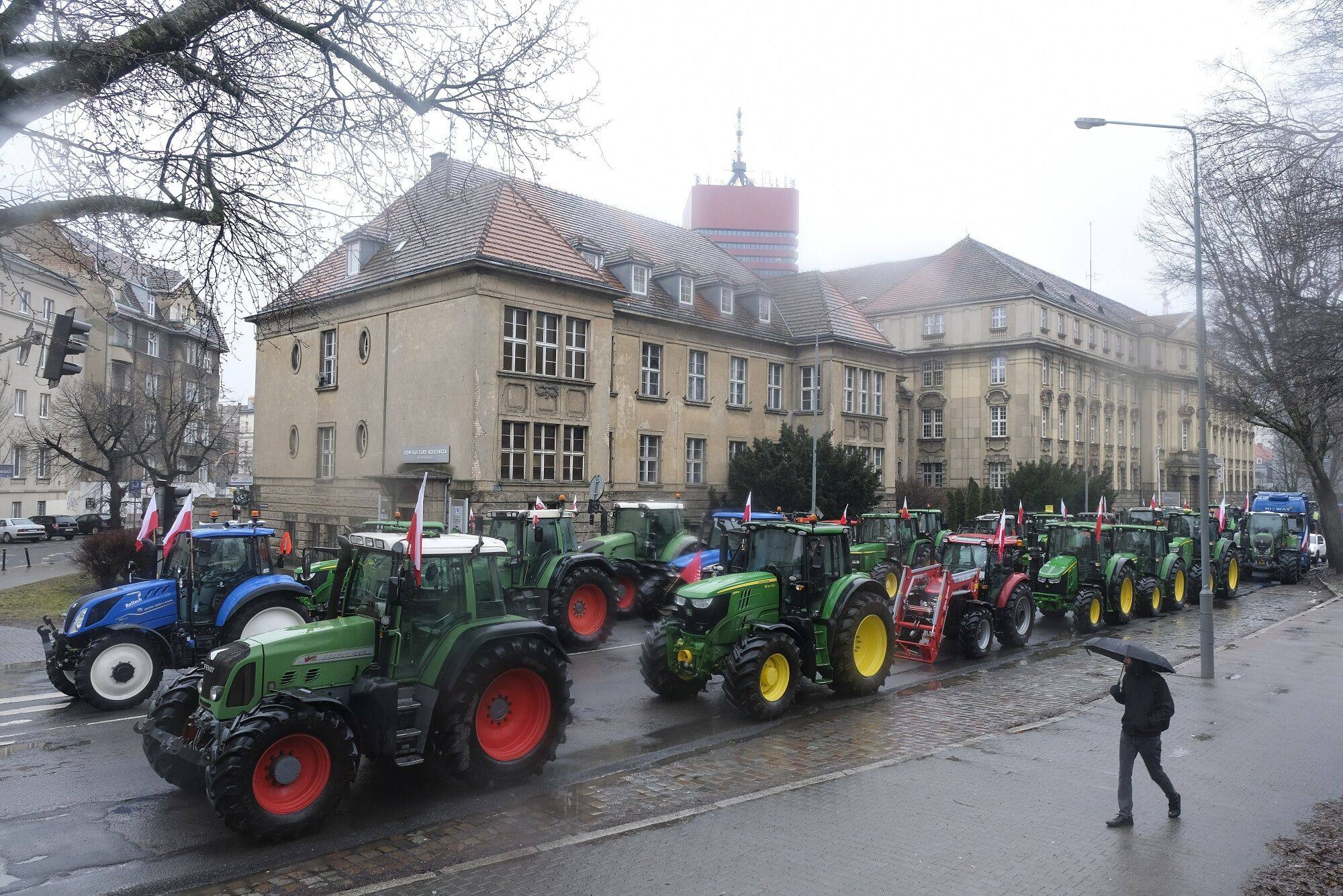 Tractors block a road during a protest by Polish farmers in Poznan, Poland, on Friday. Farmers are holding blockades across the country. Photo: Bloomberg