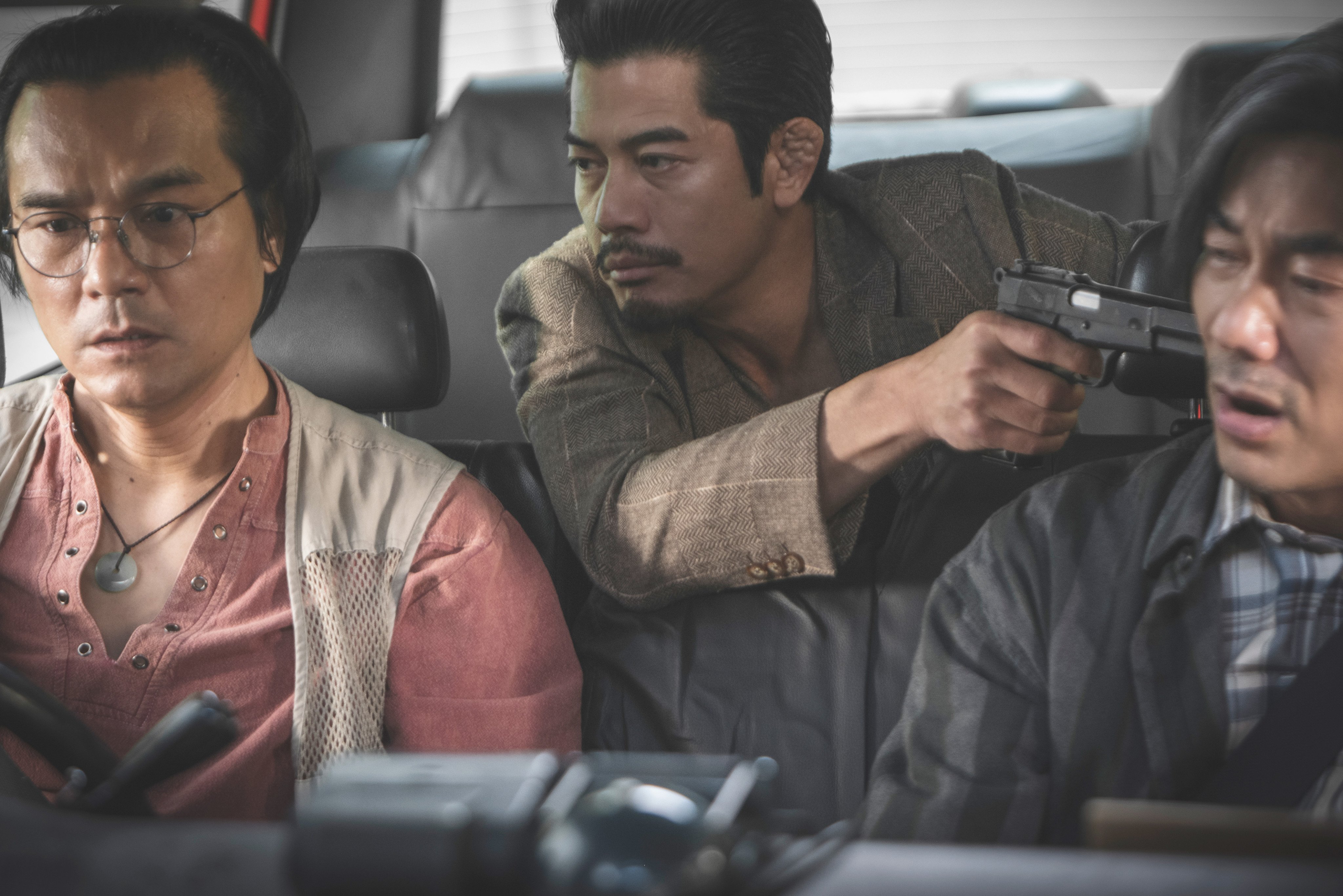 (From left) Lam Ka-tung, Aaron Kwok and Richie Jen in a still from Rob N Roll.