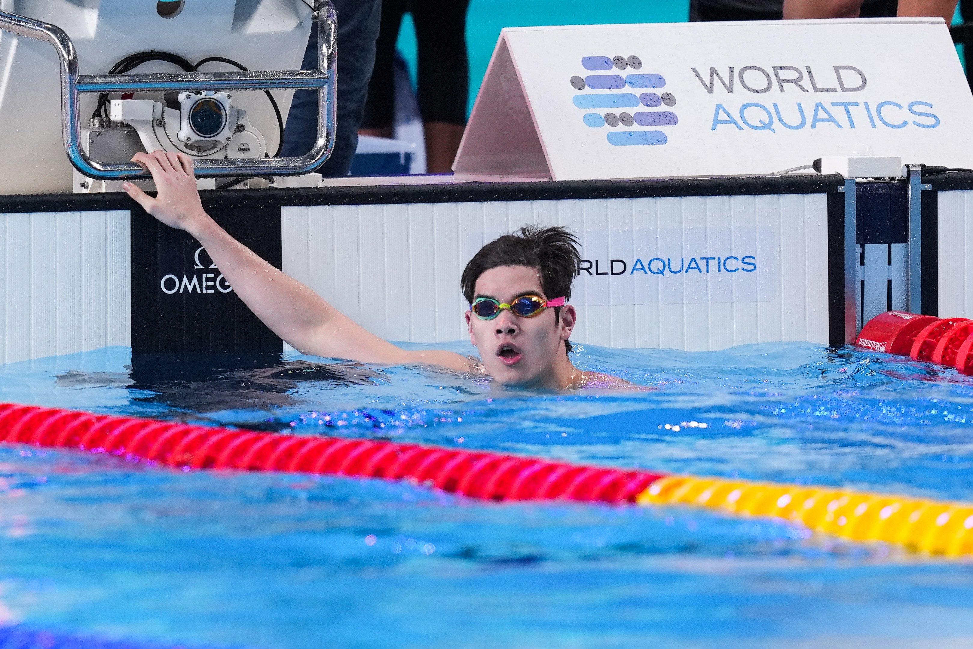 Pan Zhanle reacts after swimming the first leg of the   men’s 4x100m freestyle relay at the World Aquatics Championships. Photo: Xinhua