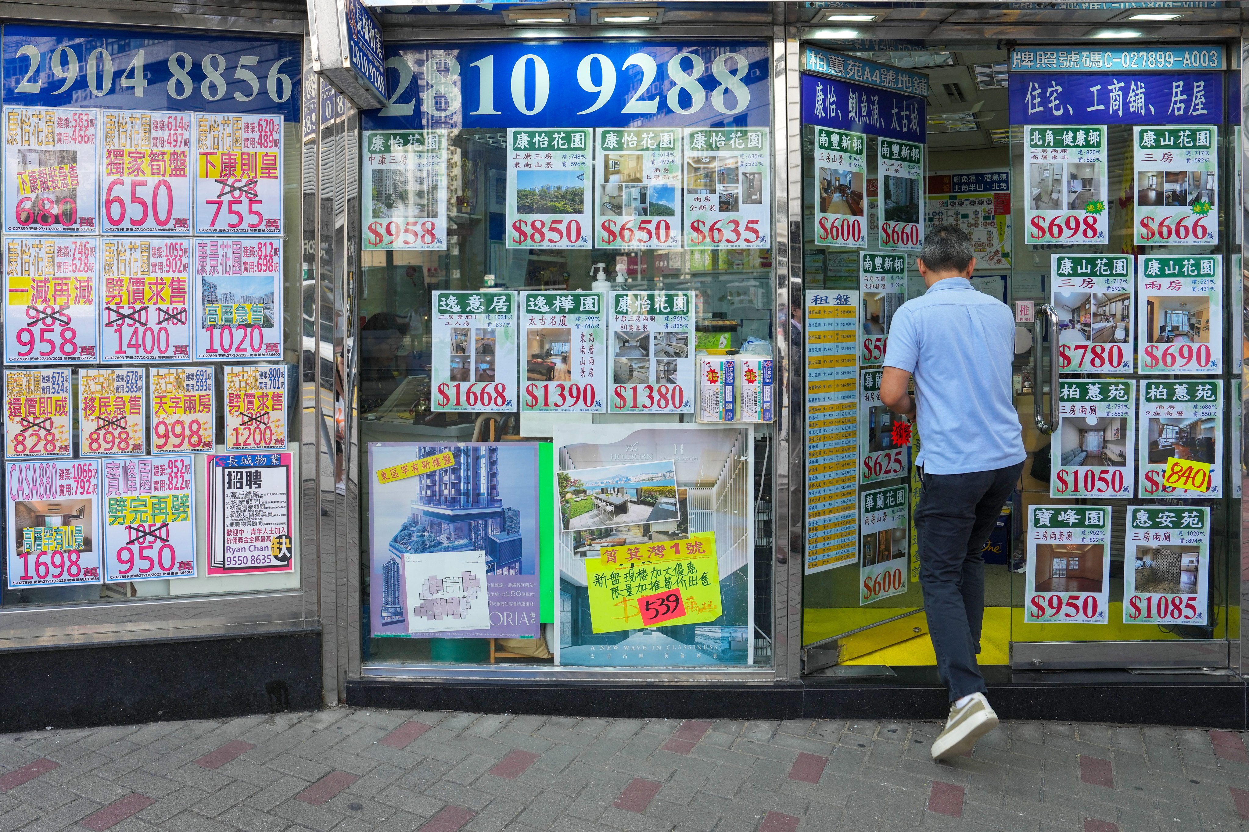 A property agency in Hong Kong’s Quarry Bay district. Goldman says the softness in Hong Kong’s residential property market is still manageable. Photo: Elson LI