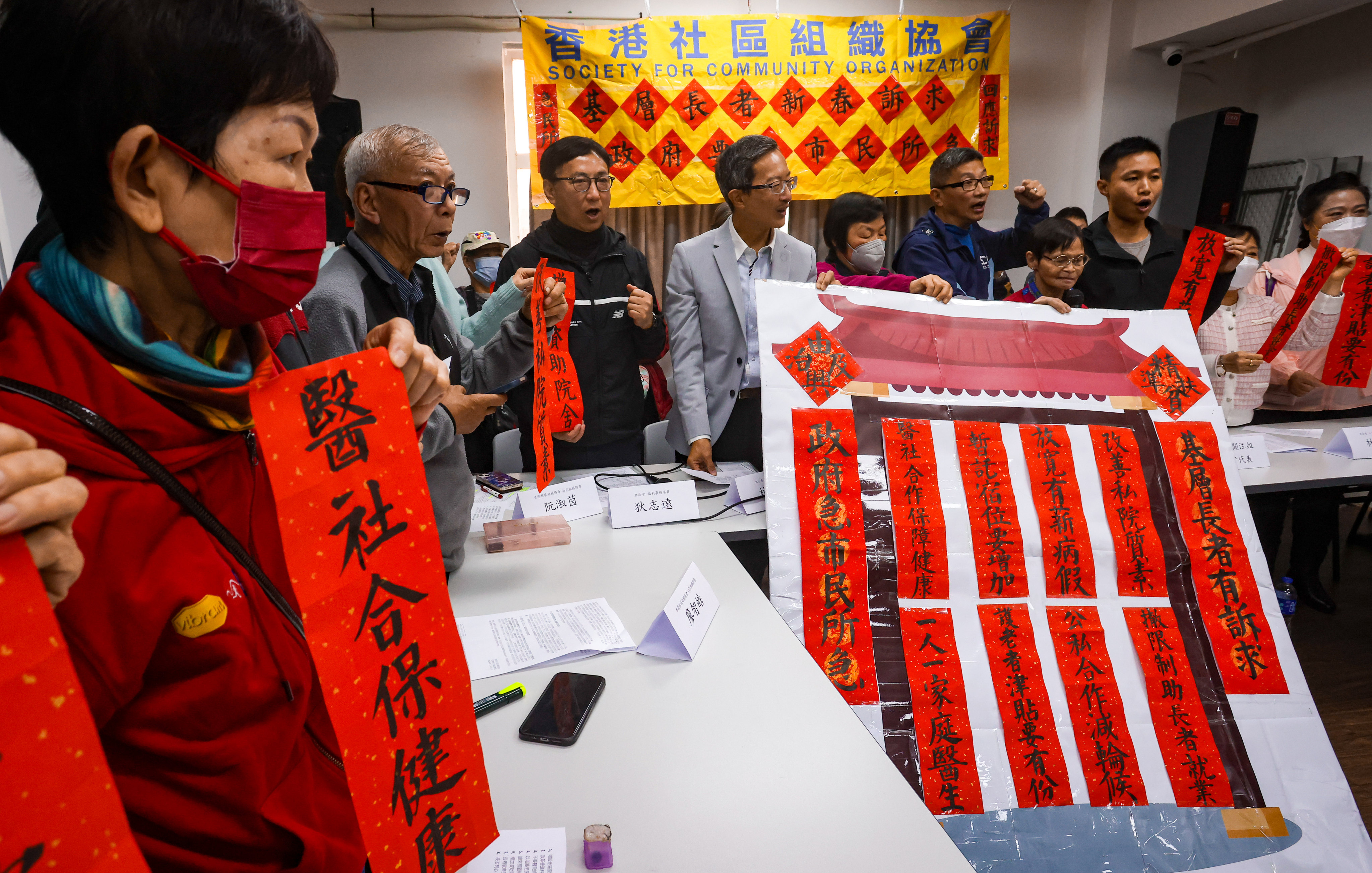 Lawmakers and elderly residents present their concerns at a media event organised by the Society for Community Organisation. Photo: Jonathan Wong