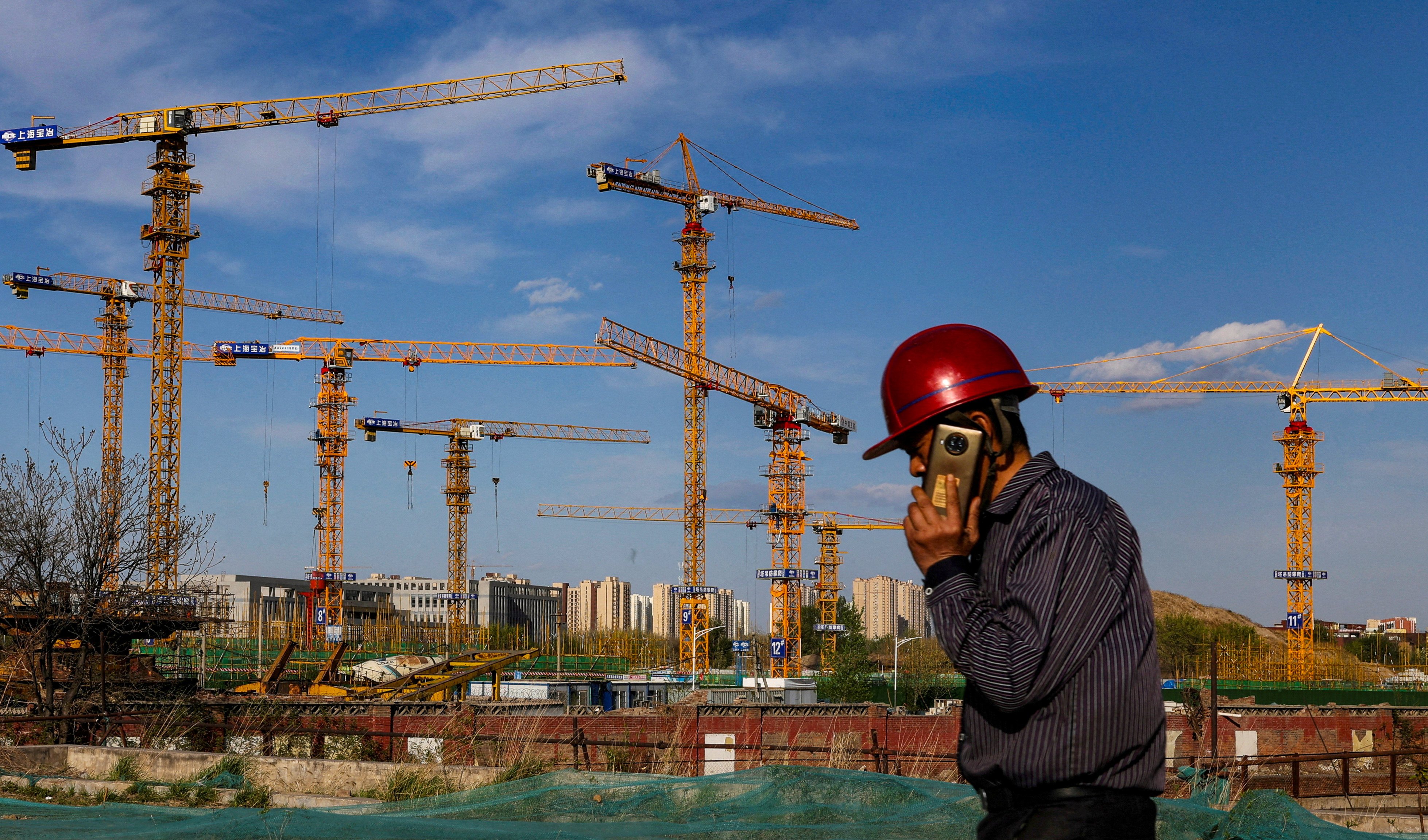 A construction site in Beijing. As of the end of January, the local governments of 170 cities had put forward 3,218 real estate projects for consideration under the whitelist mechanism, according to official figures. Photo: Reuters
