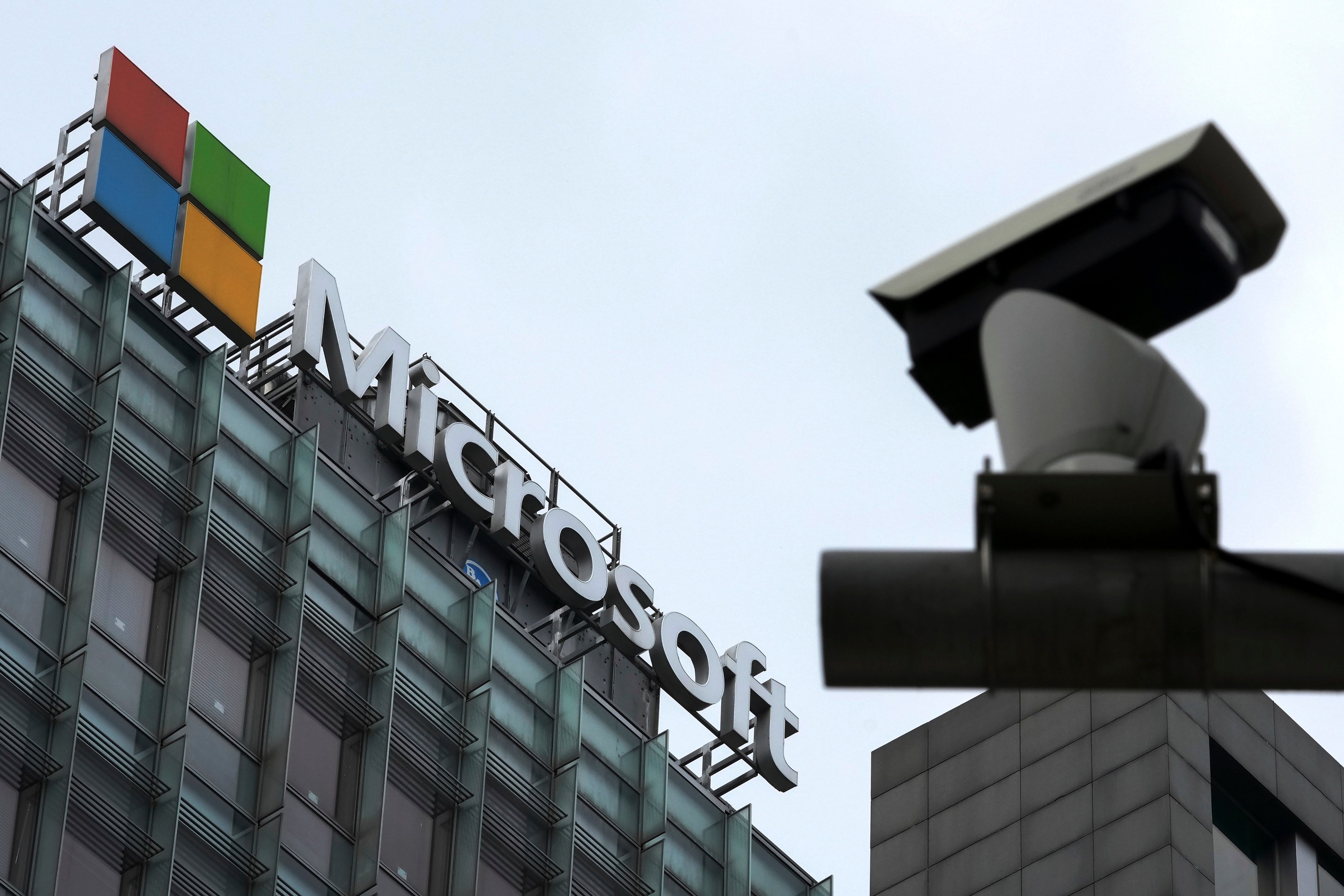 A security surveillance camera is seen near the Microsoft office building in Beijing. The company said state-backed hackers from China, and Russia have been using its AI tools. Photo: AP