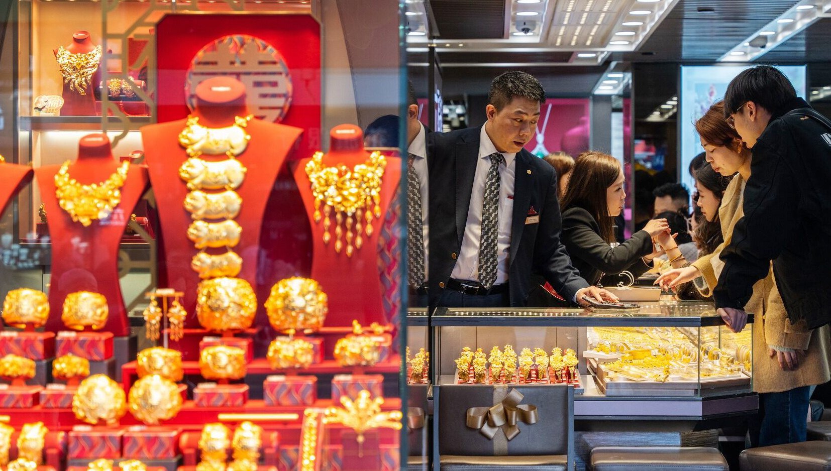 Shoppers inside a jewellery store in Hong Kong’s Tsim Sha Tsui shopping district during the Lunar New Year holiday. Photo: Bloomberg