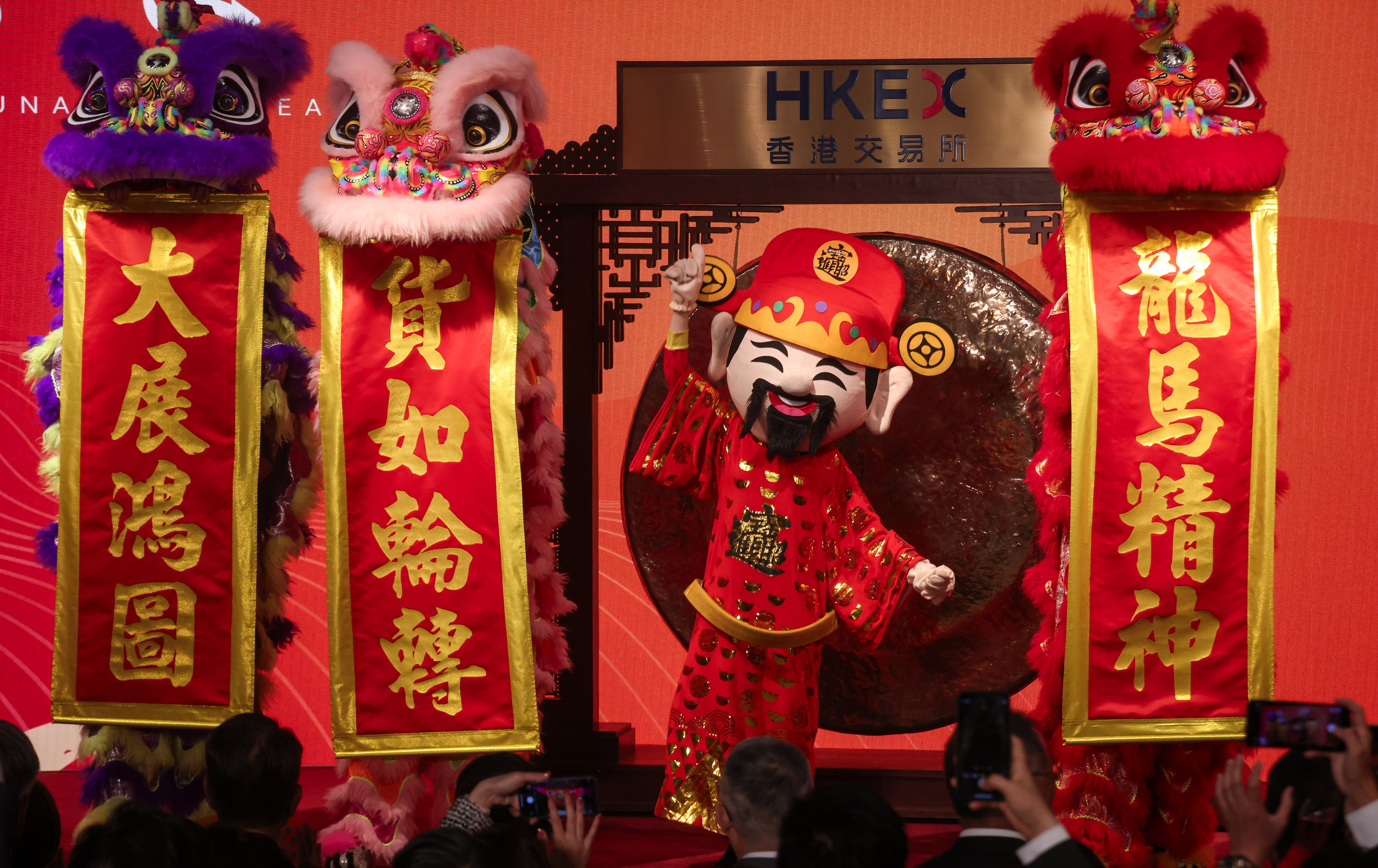 Hong Kong’s financial leaders greeted the Year of the Dragon with fanfare, optimistic that the auspicious zodiac sign will breathe some fire – or at least some life – into the city’s beaten down stock market. Photo: Jonathan Wong