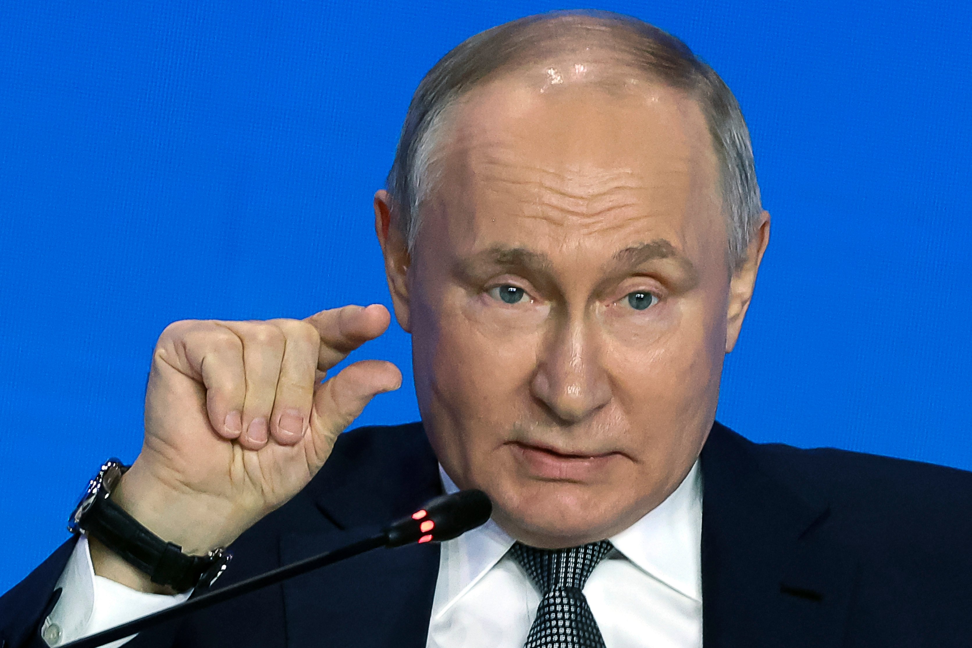 Russian President Vladimir Putin gestures as he speaks to scientists on the sidelines of the Future Technologies Forum in Moscow on Wednesday. Photo: Sputnik via AP