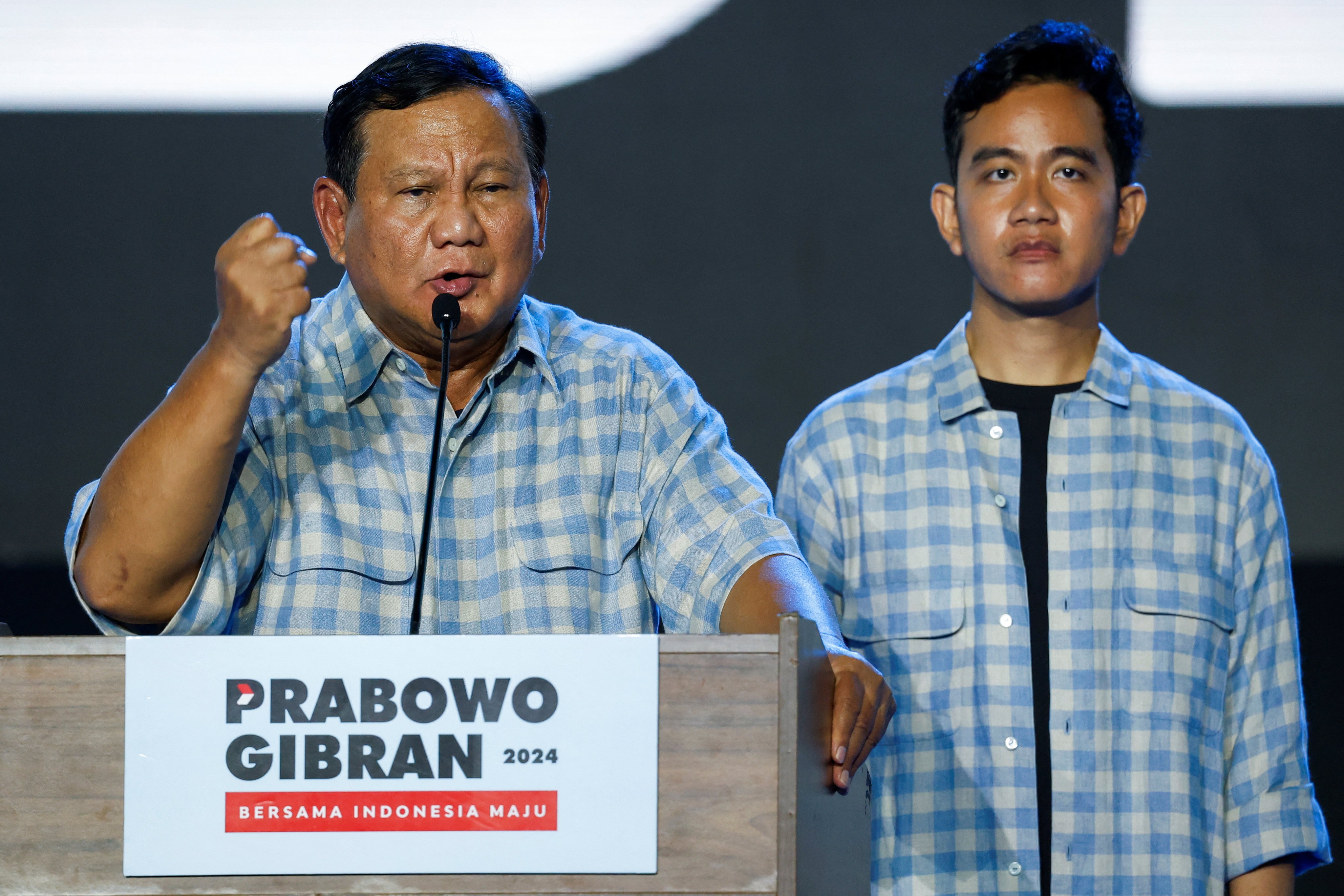 Prabowo Subianto (left) delivers an election speech with running mate Gibran Rakabuming Raka, the eldest son of Indonesian President Joko Widodo. Photo: Reuters