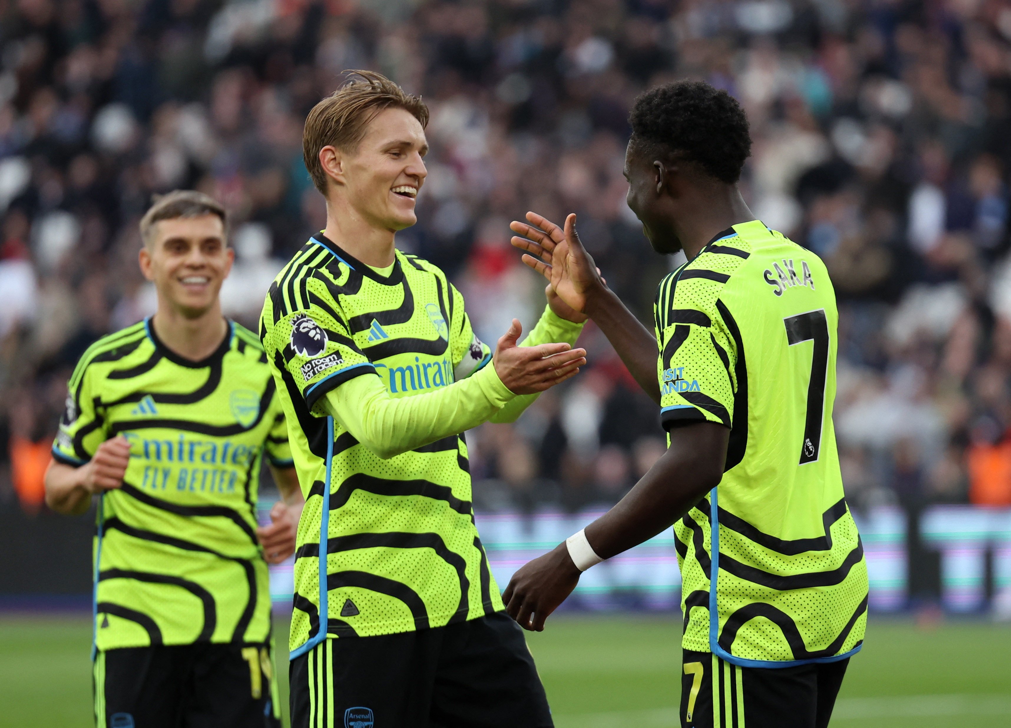 Arsenal legend Robert Pires believes Martin Odegaard (left) and Bukayo Saka can inspire Arsenal to Premier League glory. Photo: Reuters