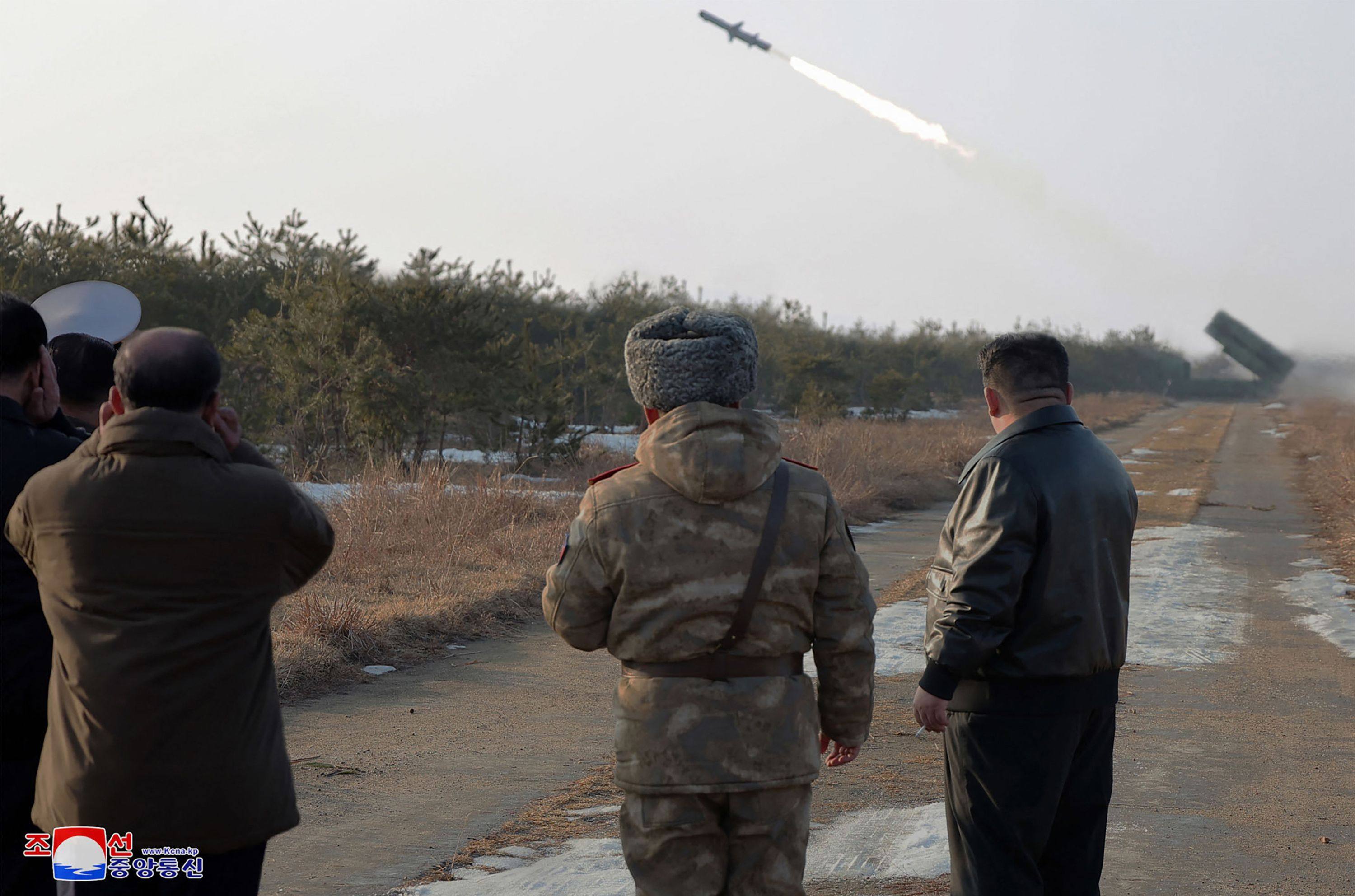 Kim Jong-un looks on during the test-fiiring of a new-type of surface-to-sea missile at an undisclosed location in North Korea on Wednesday. Photo: KCNA via KNS/AFP