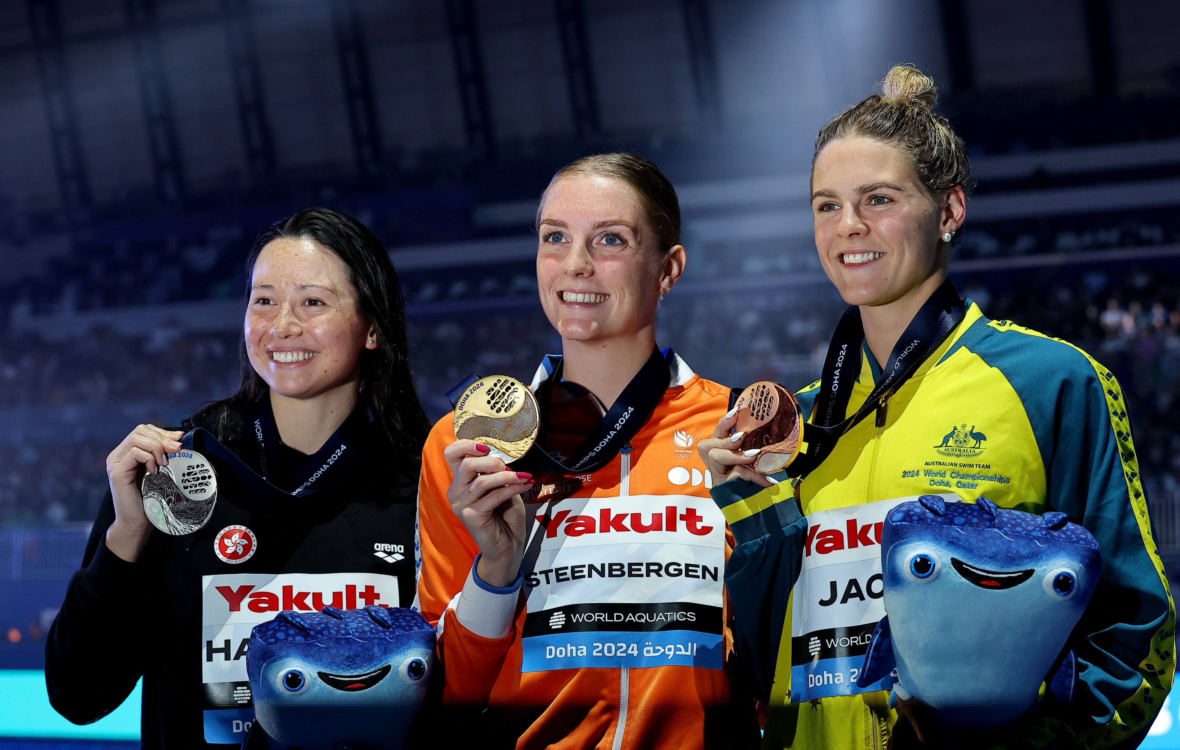 Siobhan Haughey (left) on the podium alongside Marrit Steenbergen (centre) and Shayna Jack. Photo: Reuters