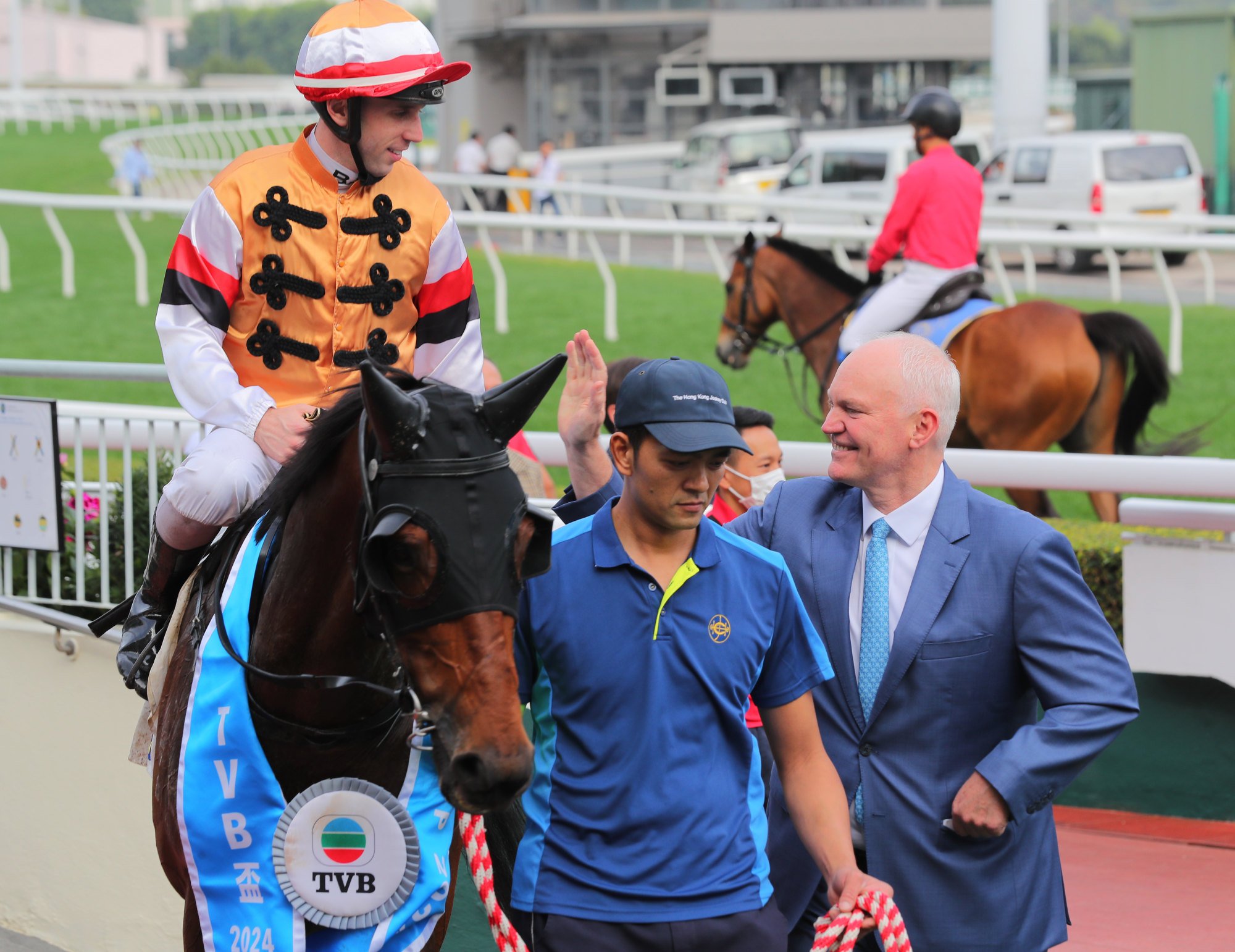 Trainer David Hall gives Atullibigeal a pat after his win.