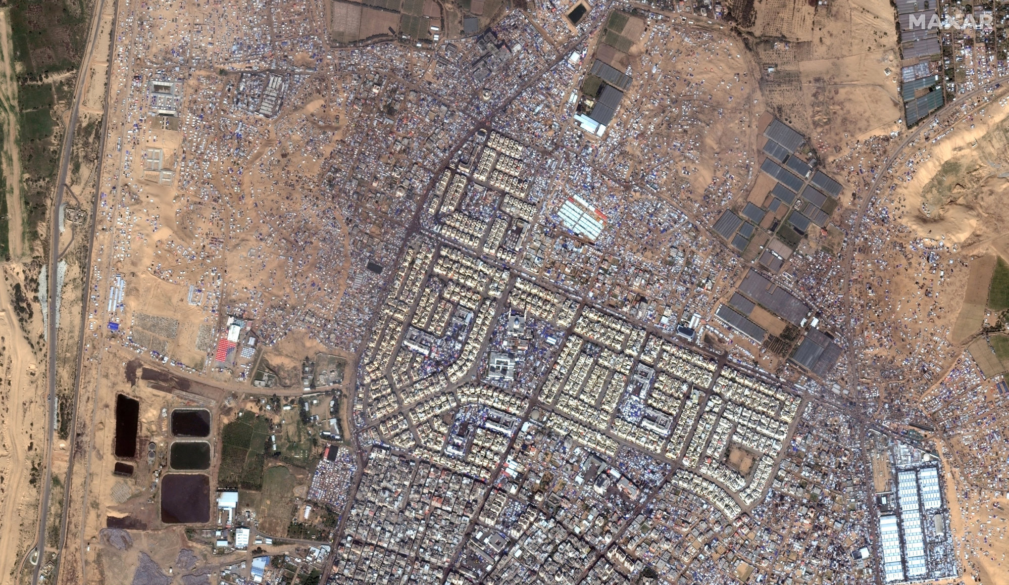 Tents and shelters of displaced people in Rafah, southern Gaza Strip. Photo Maxar Technologies via Reuters