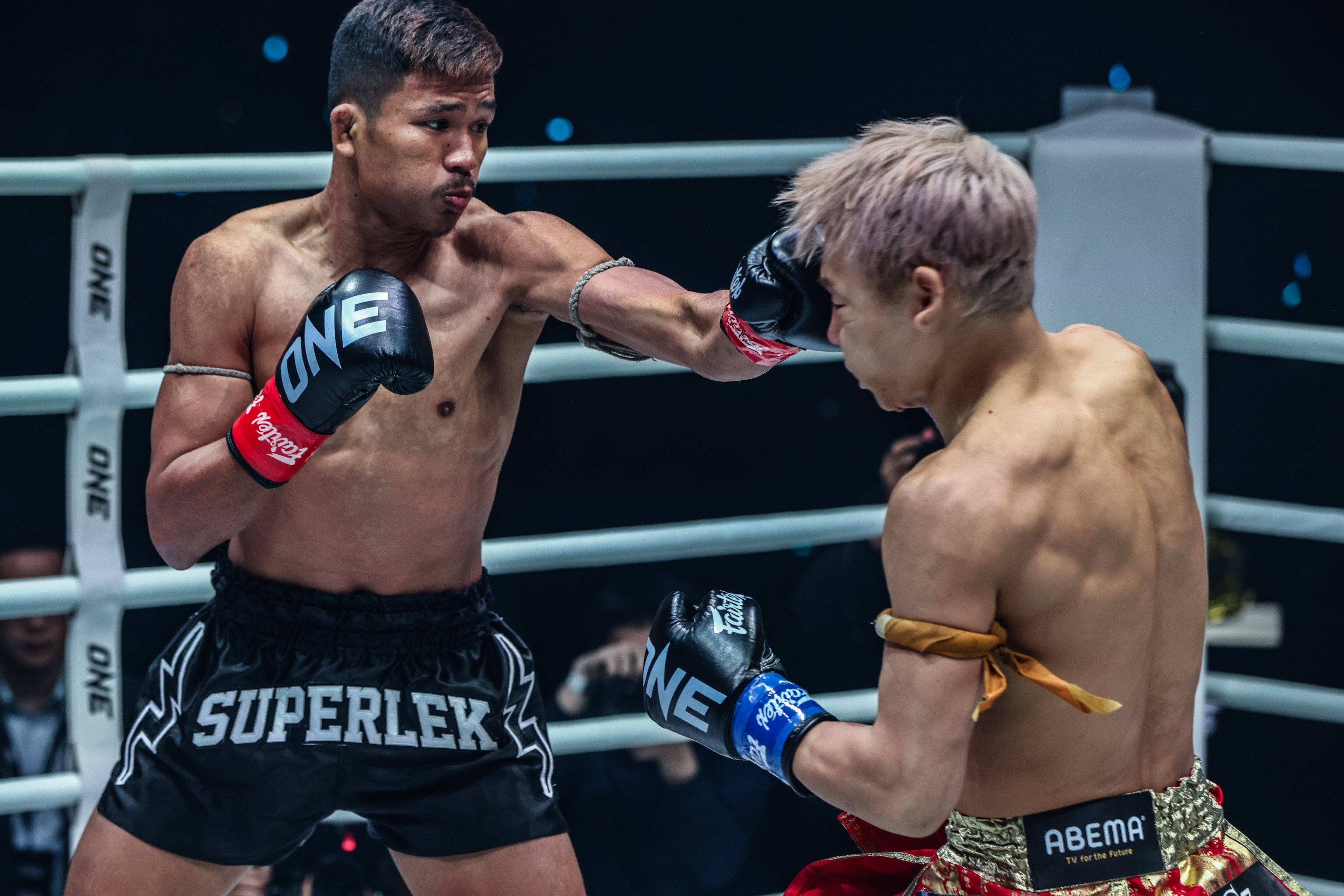 Superlek Kiatmoo9 jabs Takeru Segawa during their kickboxing fight at ONE 165 in Tokyo. Photo: ONE Championship