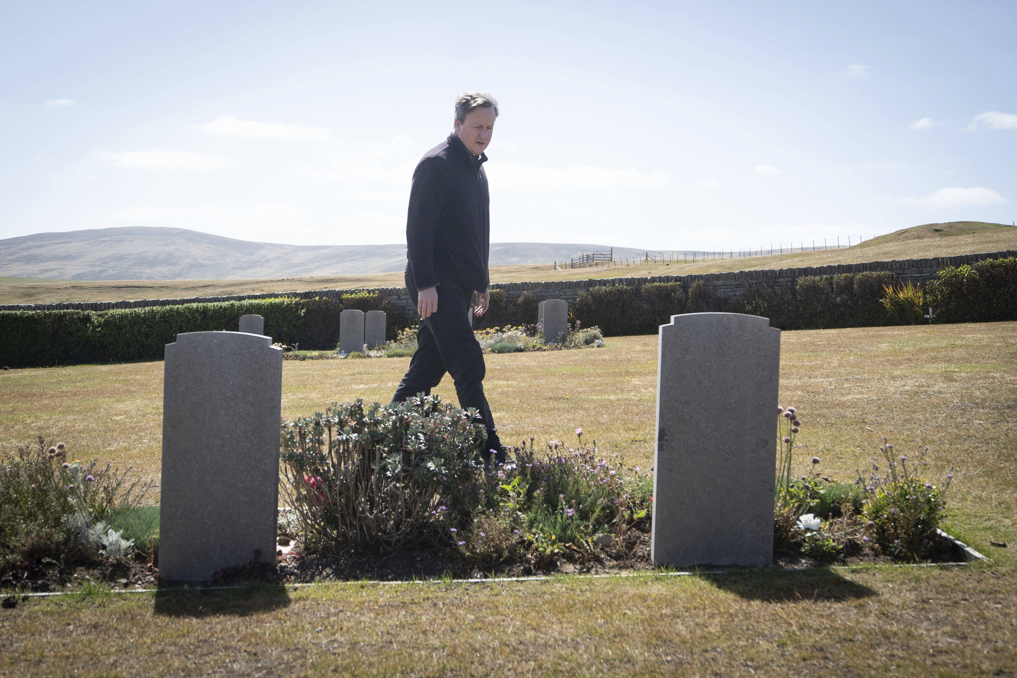 Britains’ Foreign Secretary David Cameron visits San Carlos Cemetery on the Falkland Islands on Monday. Photo: PA via AP