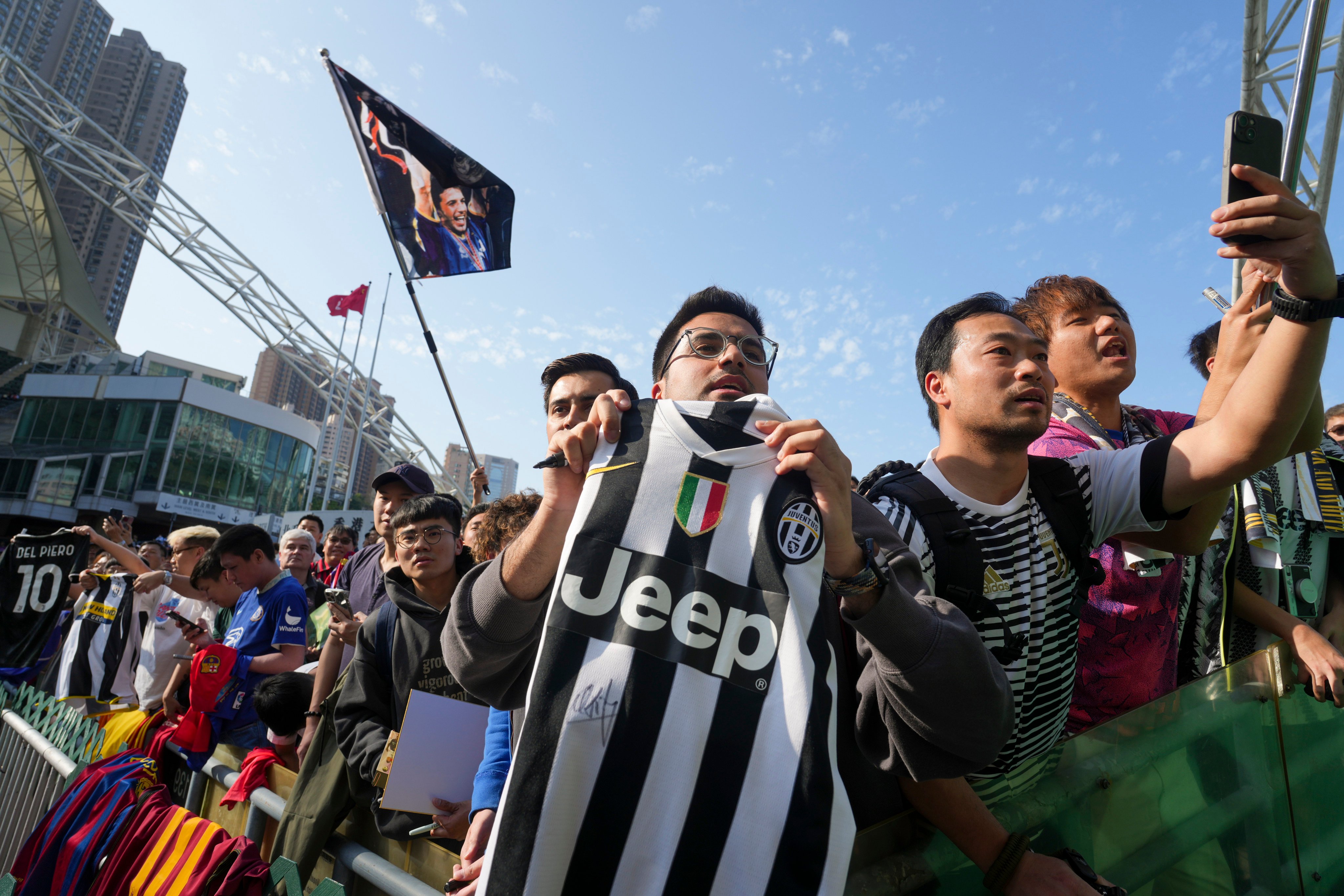 Football fans wait for autographs during the Chinese New Year Cup at Hong Kong Stadium in Causeway Bay on February 13. Tourists have and will come to Hong Kong for sports events. Photo: Sam Tsang 