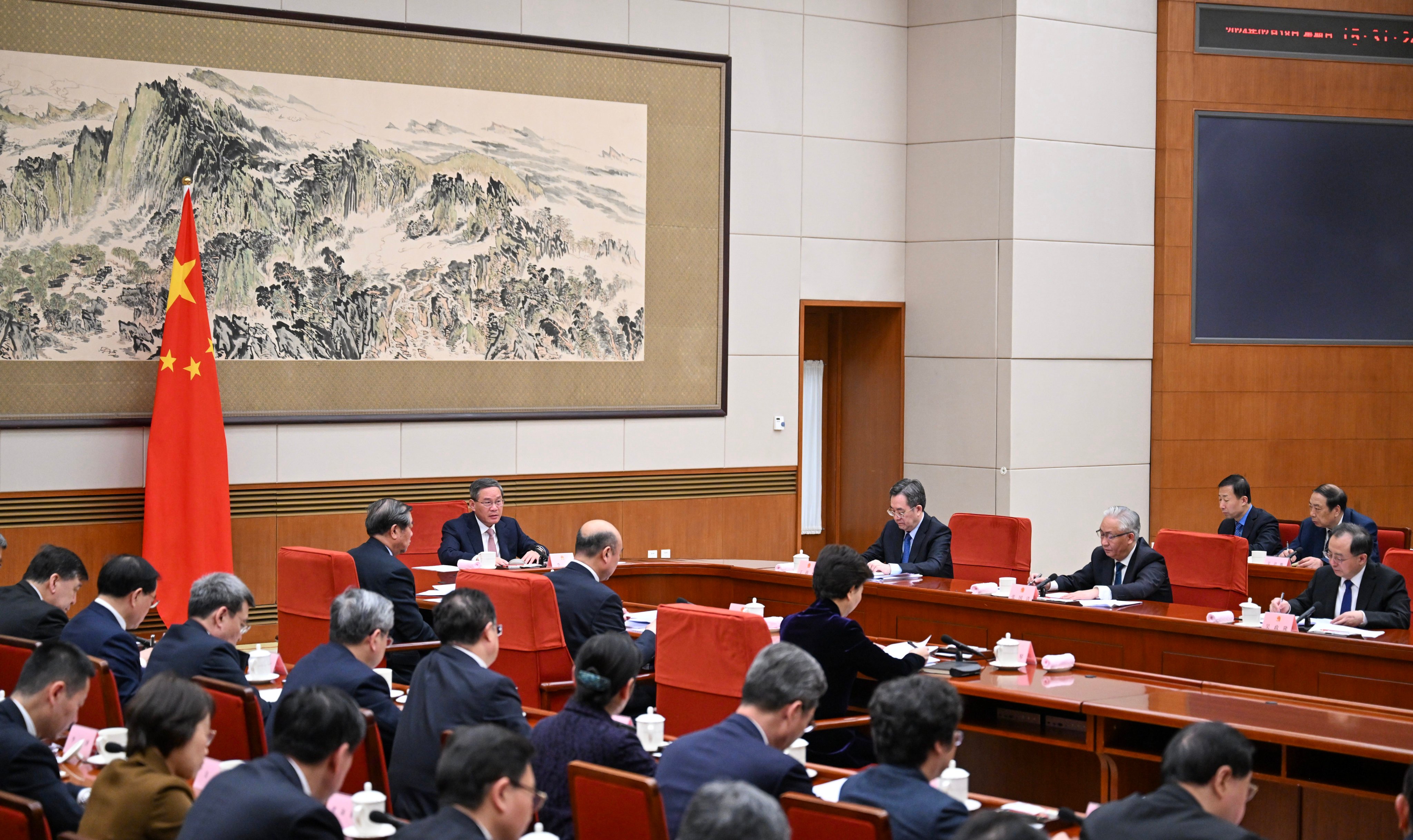 China’s State Council during a plenary meeting. The council has issued a warning to local governments not to impose heavy fines as a means of generating revenue. Photo: Xinhua
