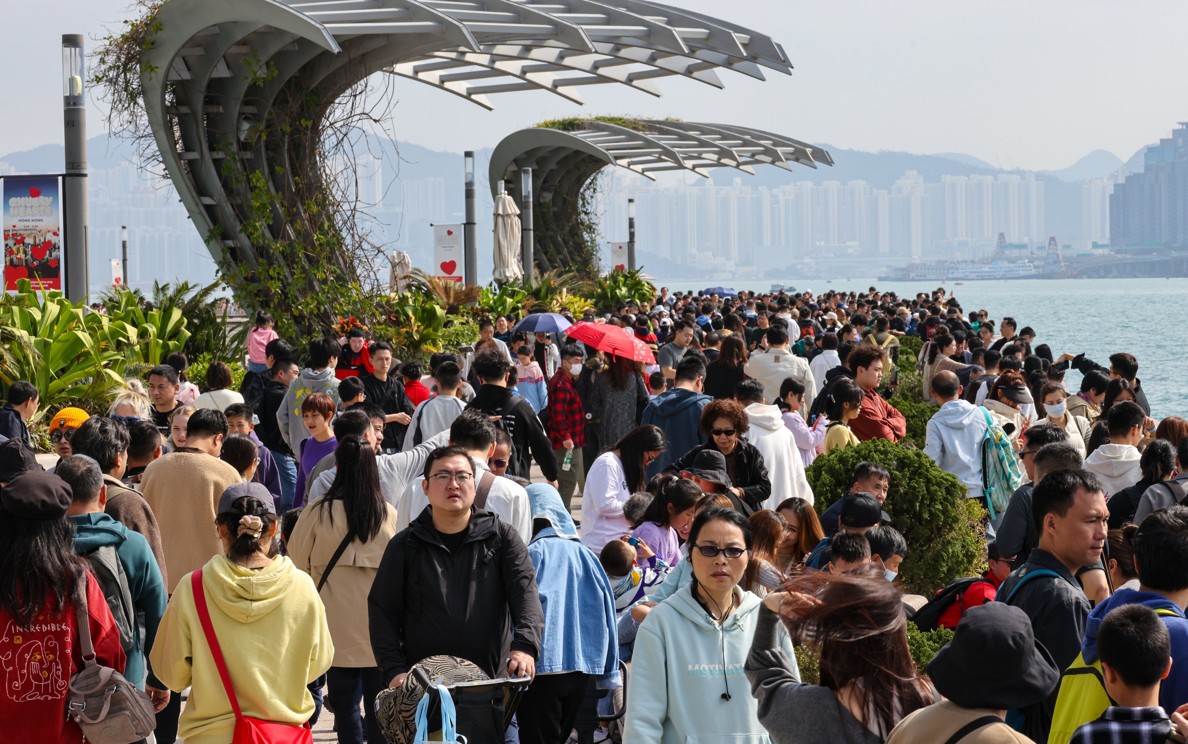 Mainland tourists throng the Avenue of Stars in Tsim Sha Tsui on February 12. The government says visitor numbers over the Lunar New Year recovered to surpass 2018 levels. Photo: Yik Yeung-man