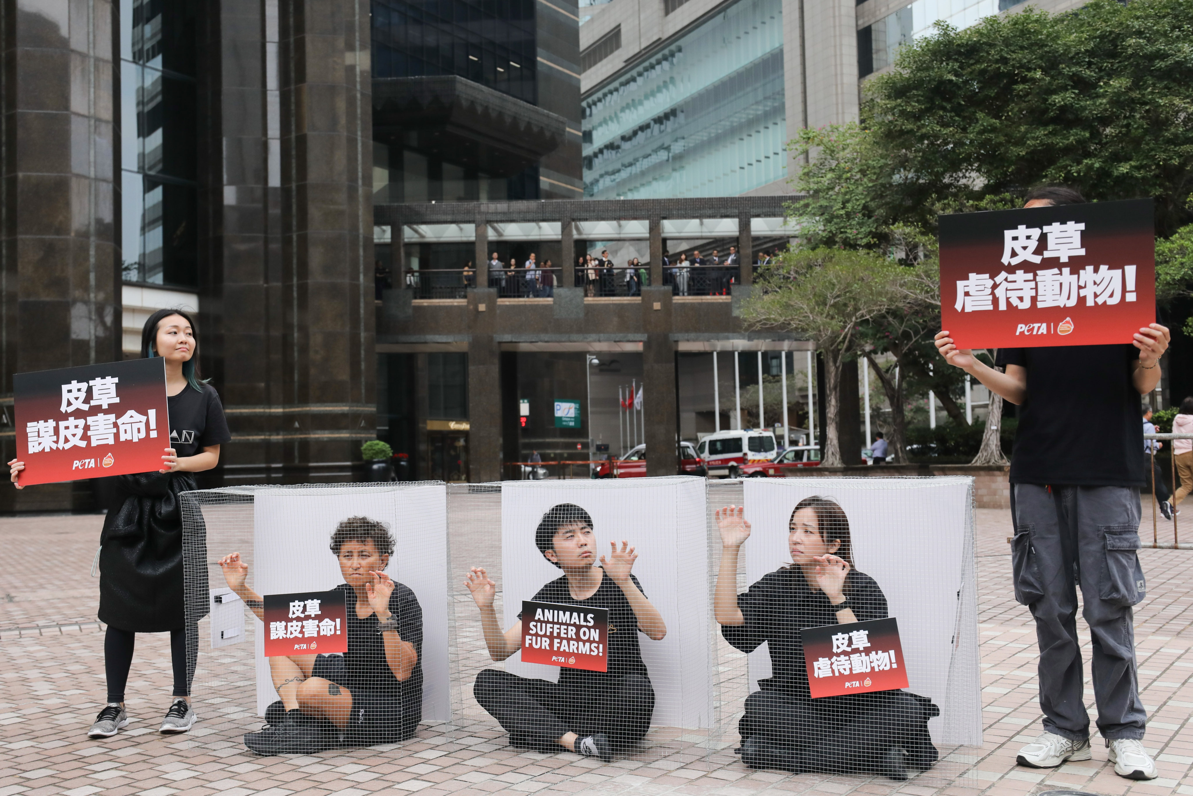 Activists outside the Convention and Exhibition Centre. The protest was jointly organised by the People for the Ethical Treatment of Animals and Fur Free Hong Kong. Photo: Xiaomei Chen