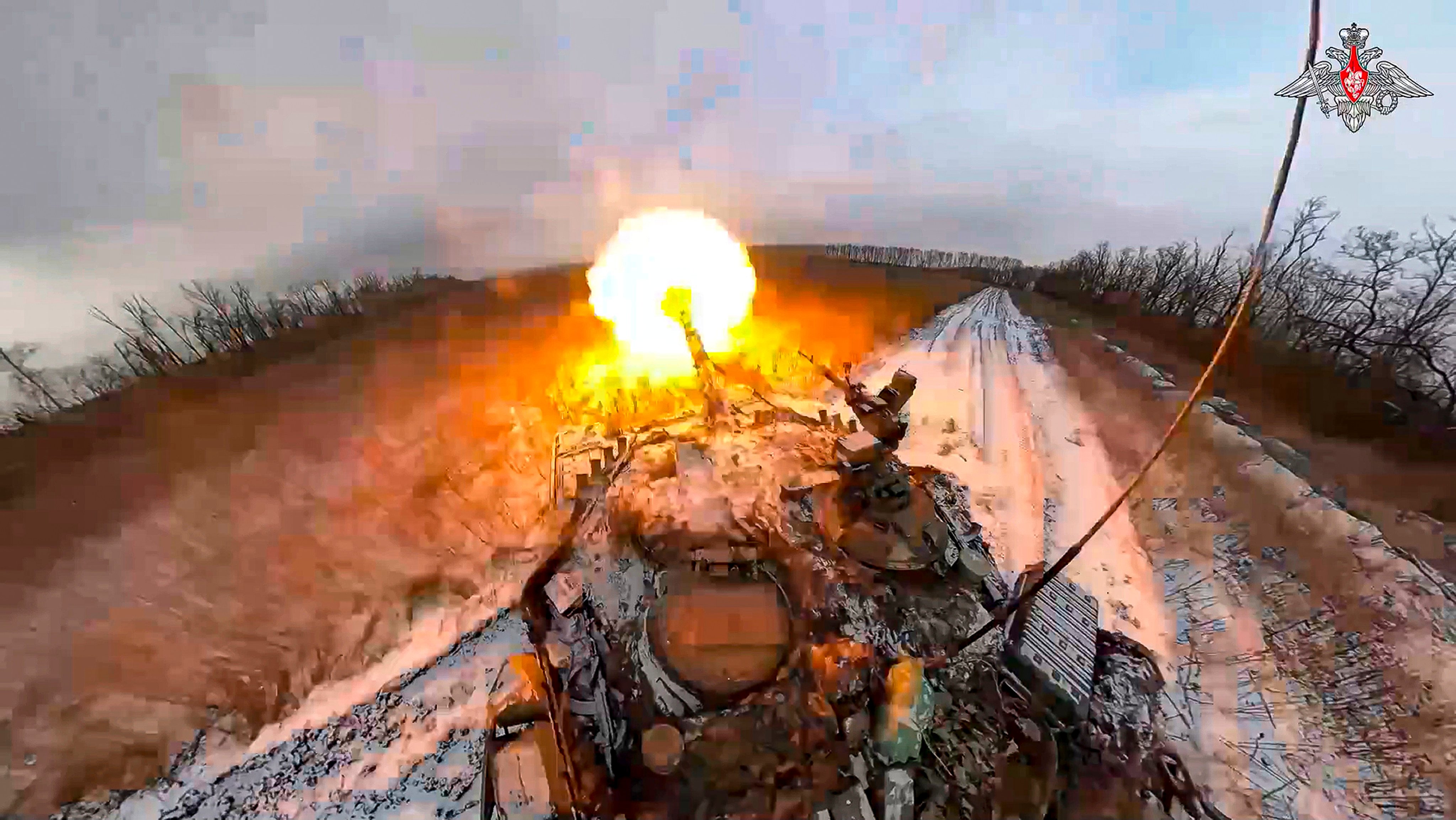 A Russian tank fires a cannon at an undisclosed location in Ukraine. Photo: Russian Defense Ministry Press Service via AP