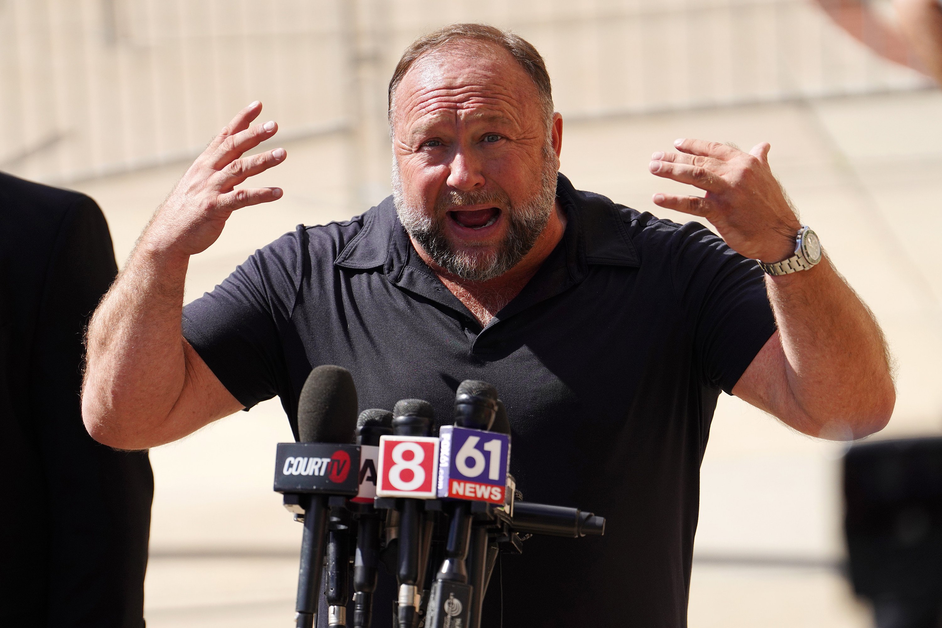 InfoWars founder Alex Jones speaks to the media outside Waterbury Superior Court during his trial in September 2022, in Waterbury, Connecticut. Photo: Getty Images/TNS