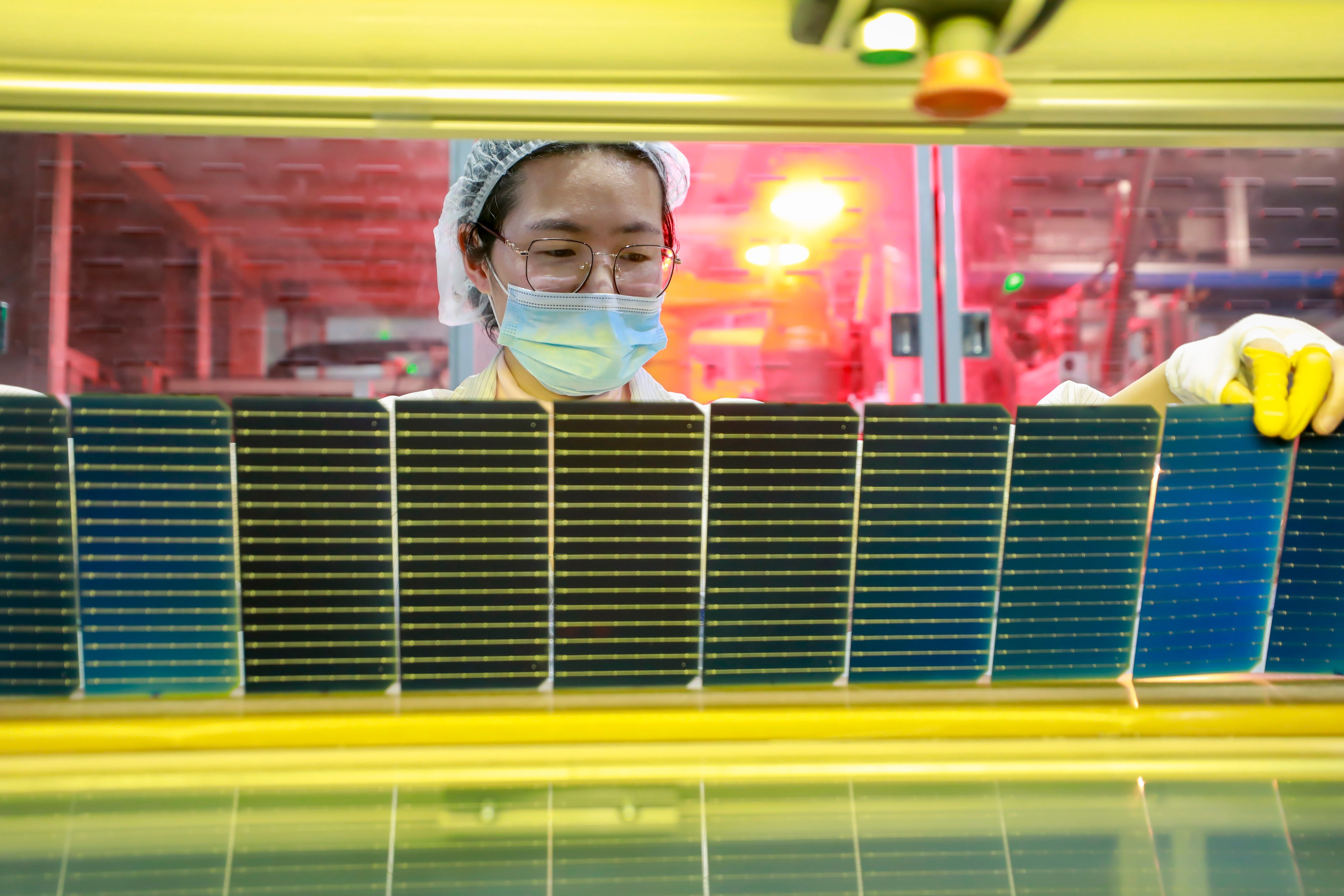 China’s annual supply capacity of solar panels reached between 800 gigawatts and 1,100 gigawatts last year, well ahead of projected global demand of some 300 gigawatts, according to the Economist Intelligence Unit. Photo: Getty Images
