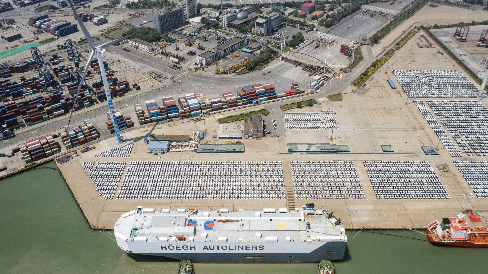 Vehicles at a yard near Tianjin port in China on June 30. China rolled out a number of measures to open up its free-trade zones as state leaders go on a charm offensive to woo foreign investors. Photo: Bloomberg