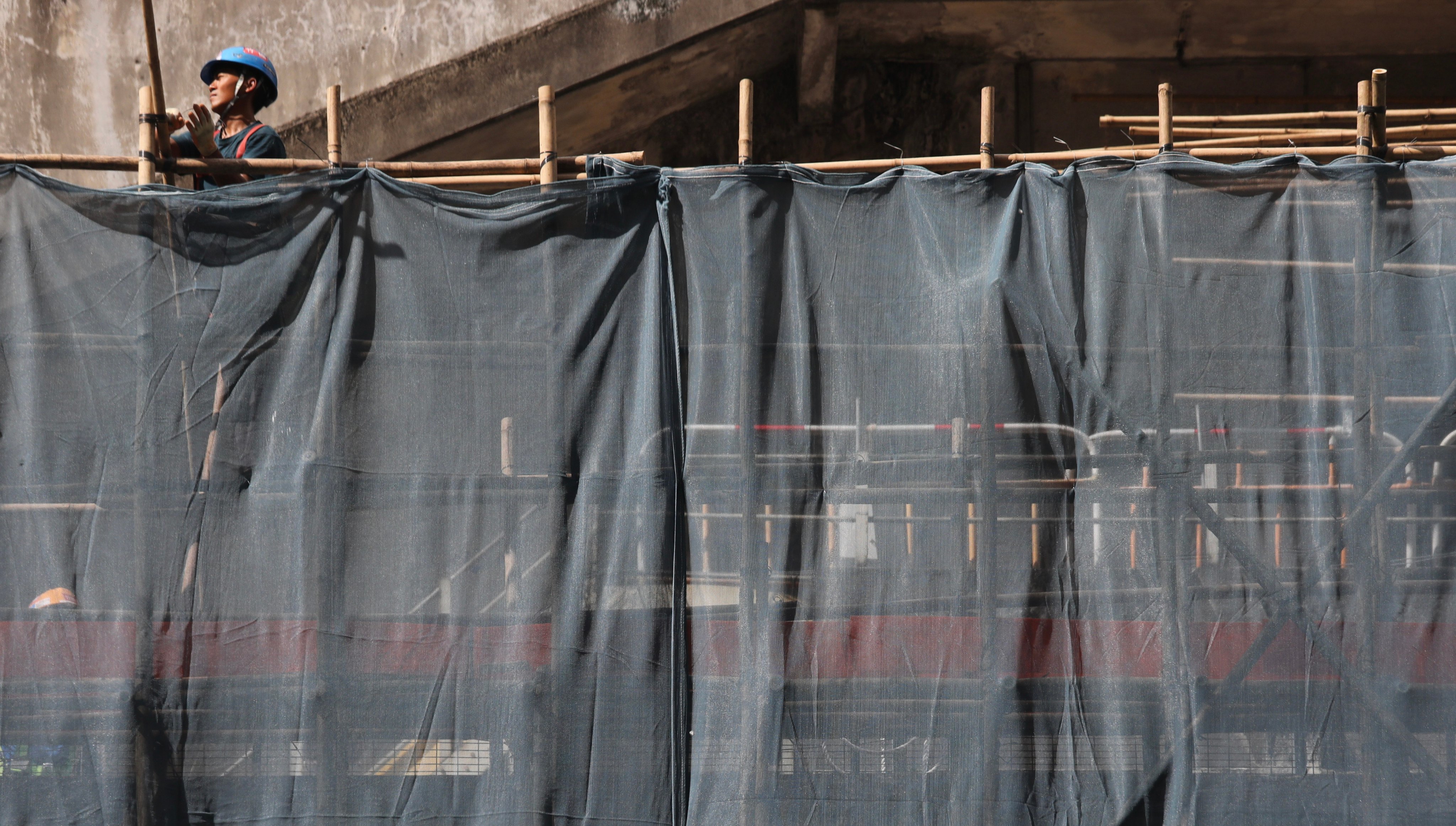 A  construction worker at work in Fortress Hill on 21 February, 2024. Photo: Xiaomei Chen