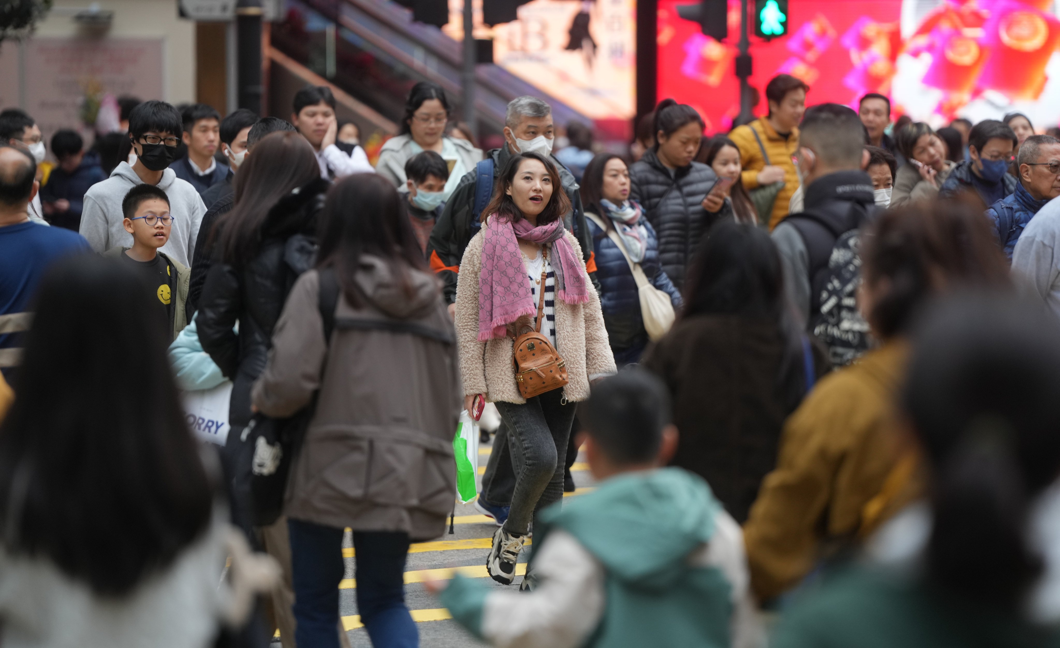 People in the city’s Causeway Bay bundle up against the cold earlier this month. Photo: Sam Tsang