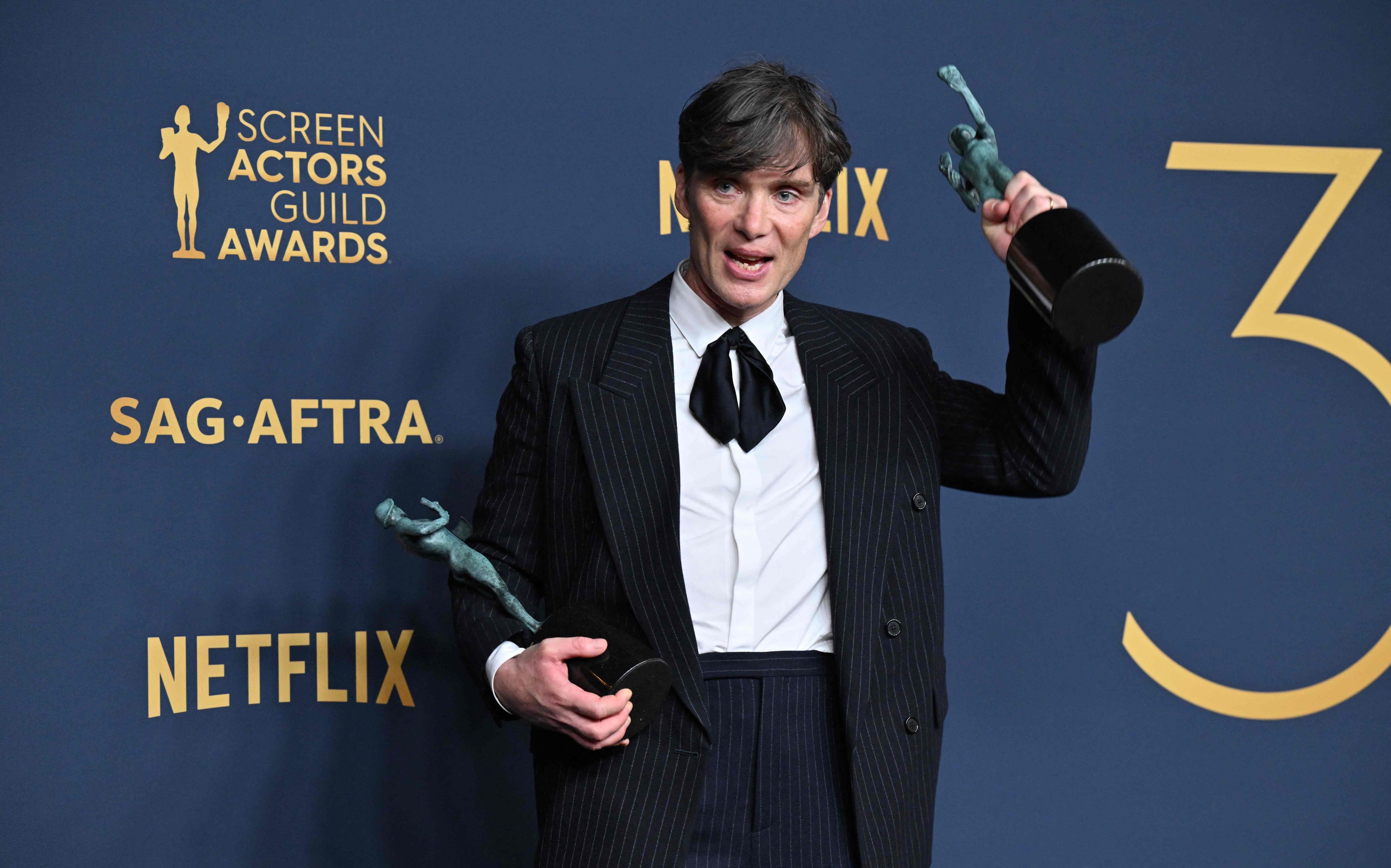 Irish actor Cillian Murphy poses in the press room with his trophies during the Screen Actors Guild Awards in Los Angeles on Saturday. Photo: AFP