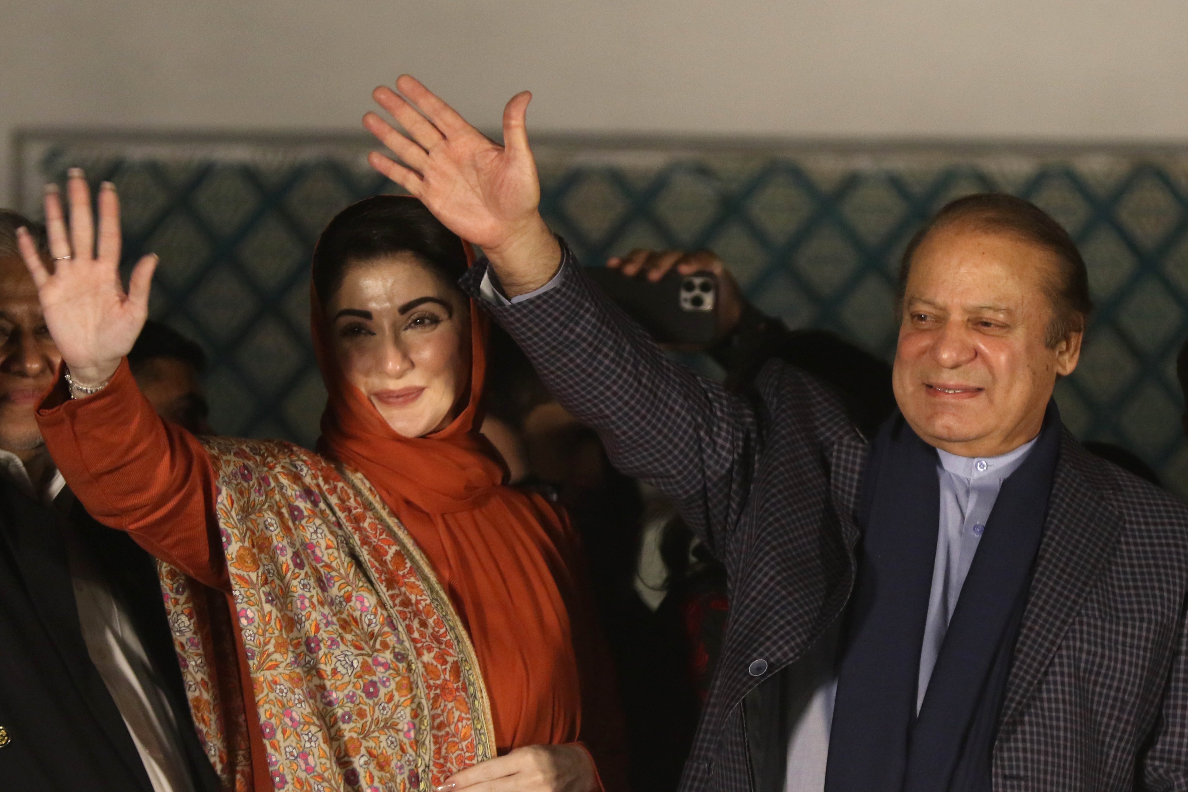 Nawaz Sharif (right), former prime minister and leader of the Pakistan Muslim League Nawaz, and his daughter Maryam Nawaz wave to supporters in Lahore. Maryam was elected chief minister in her family’s long-time power base of Punjab province. Photo: EPA-EFE
