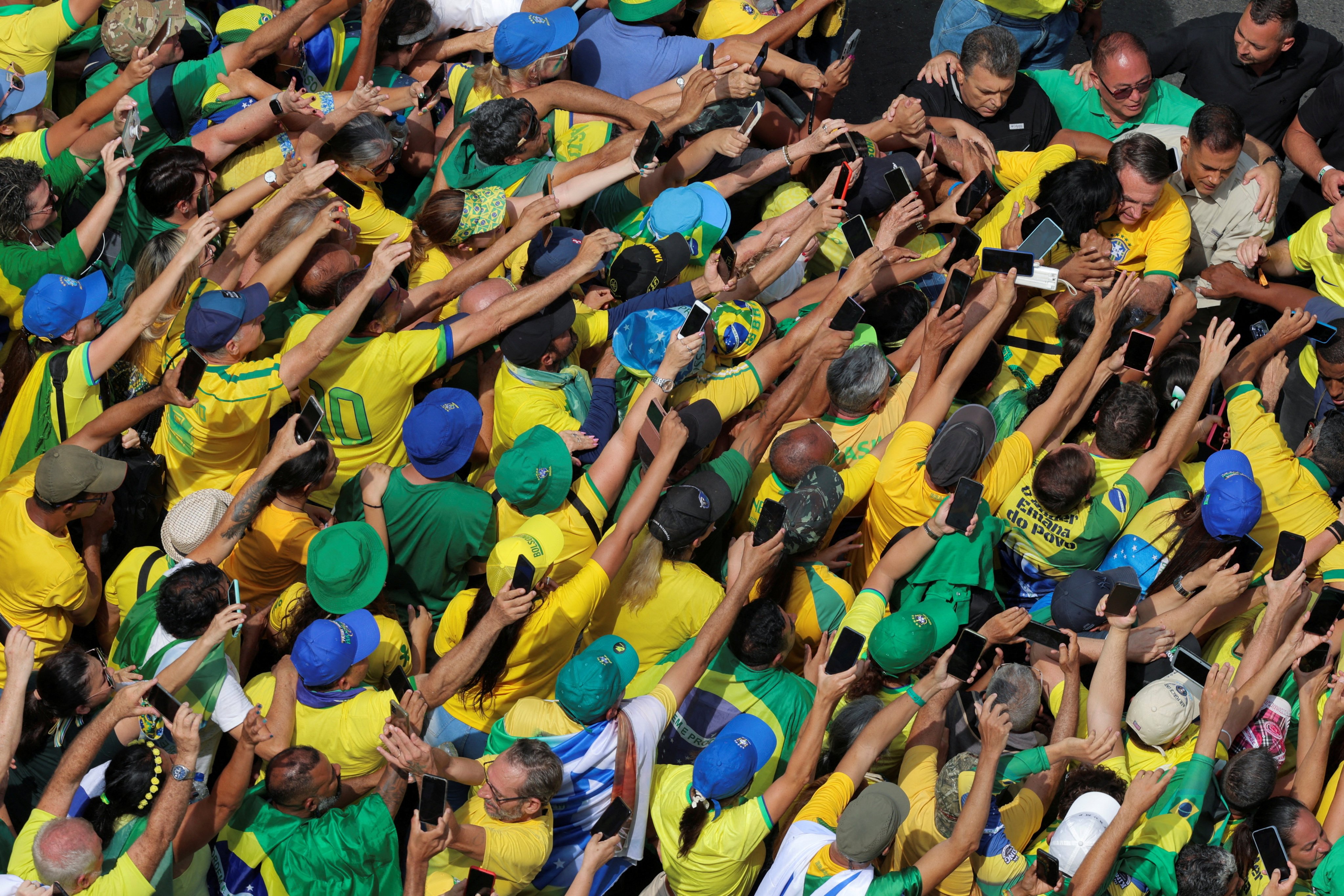 Brazil’s former president Jair Bolsonaro greets supporters gathered in Sao Paulo, Brazil. Photo: Reuters