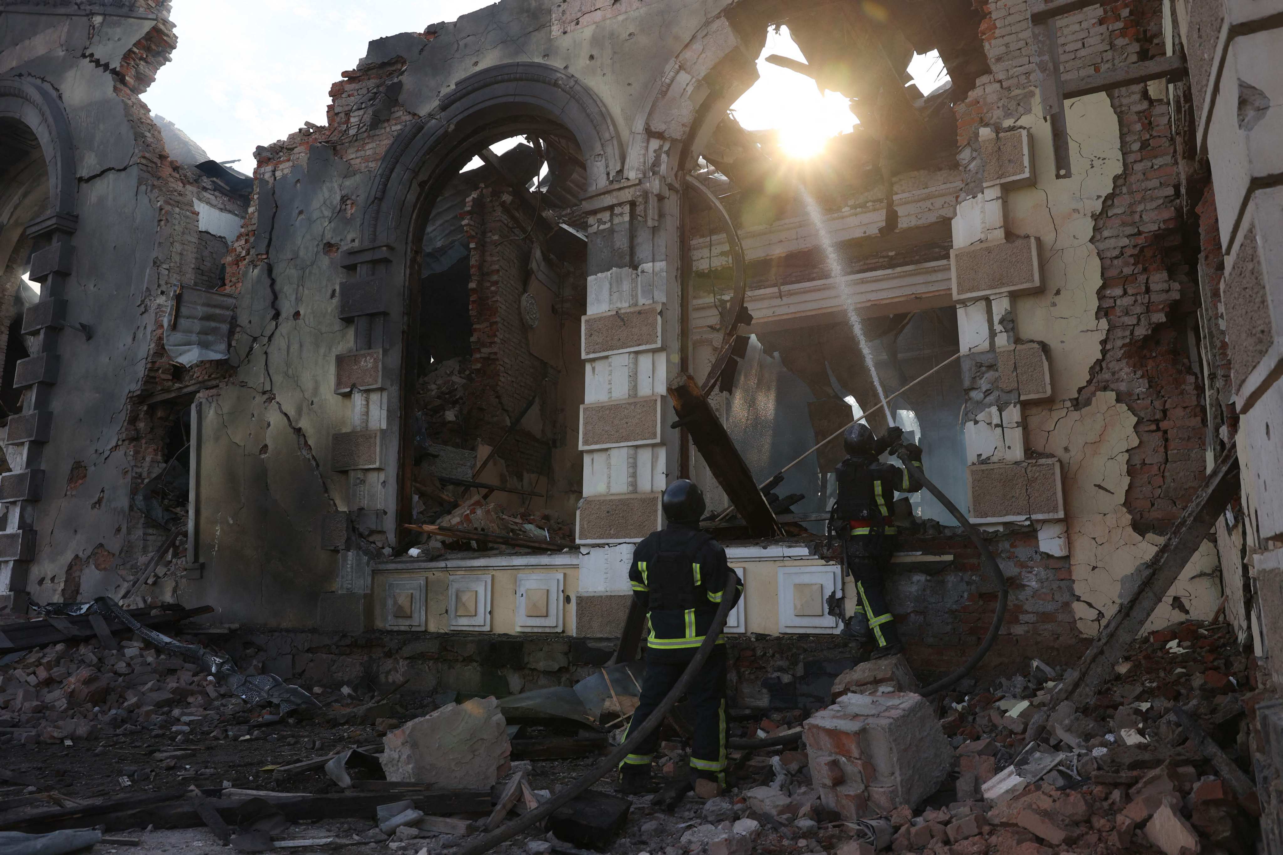 Firefighters extinguish a fire at a railway station destroyed by a Russian missile attack in Konstyantynivka, Ukraine. Photo: AFP