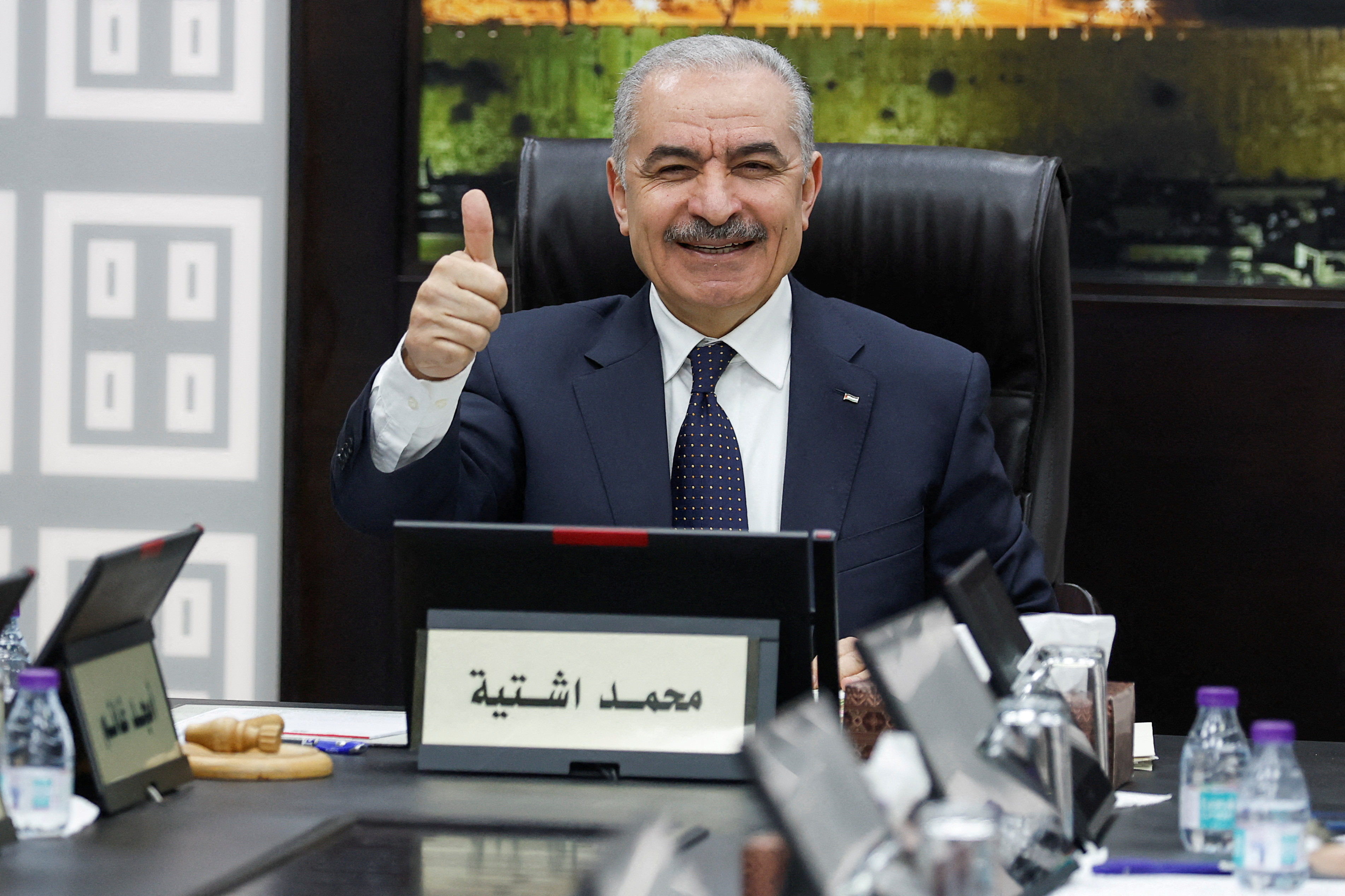 Palestinian Territories’ Prime Minister Mohammad Shtayyeh gestures as he convenes a cabinet meeting in Ramallah. Photo: Reuters