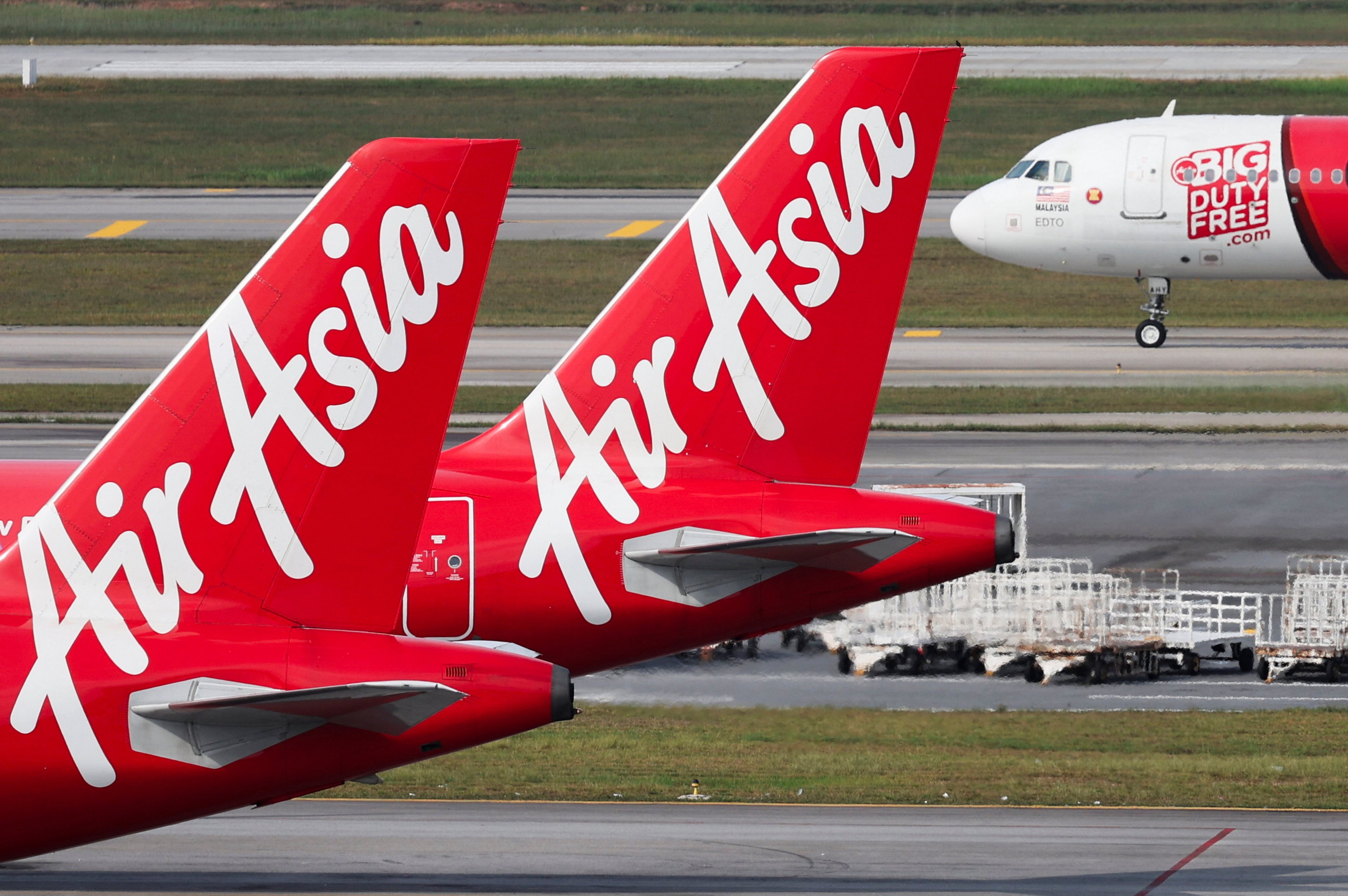 AirAsia planes are seen on the tarmac at Kuala Lumpur International Airport on Monday. The airline’s founder said he expects 2024 to be ‘very good’ for his companies and 2025 to be ‘amazing’. Photo: Reuters
