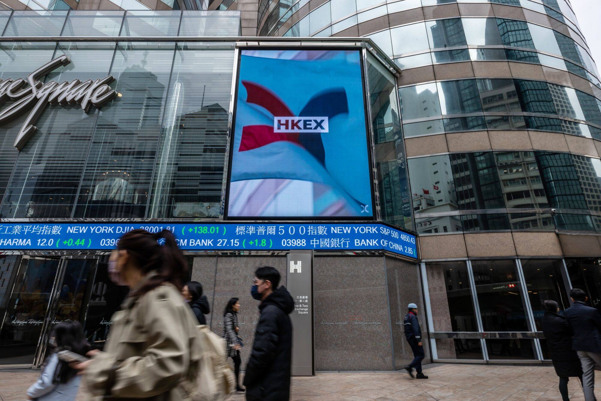 An electronic ticker at Exchange Square, which houses the Hong Kong stock exchange. Photo: Bloomberg