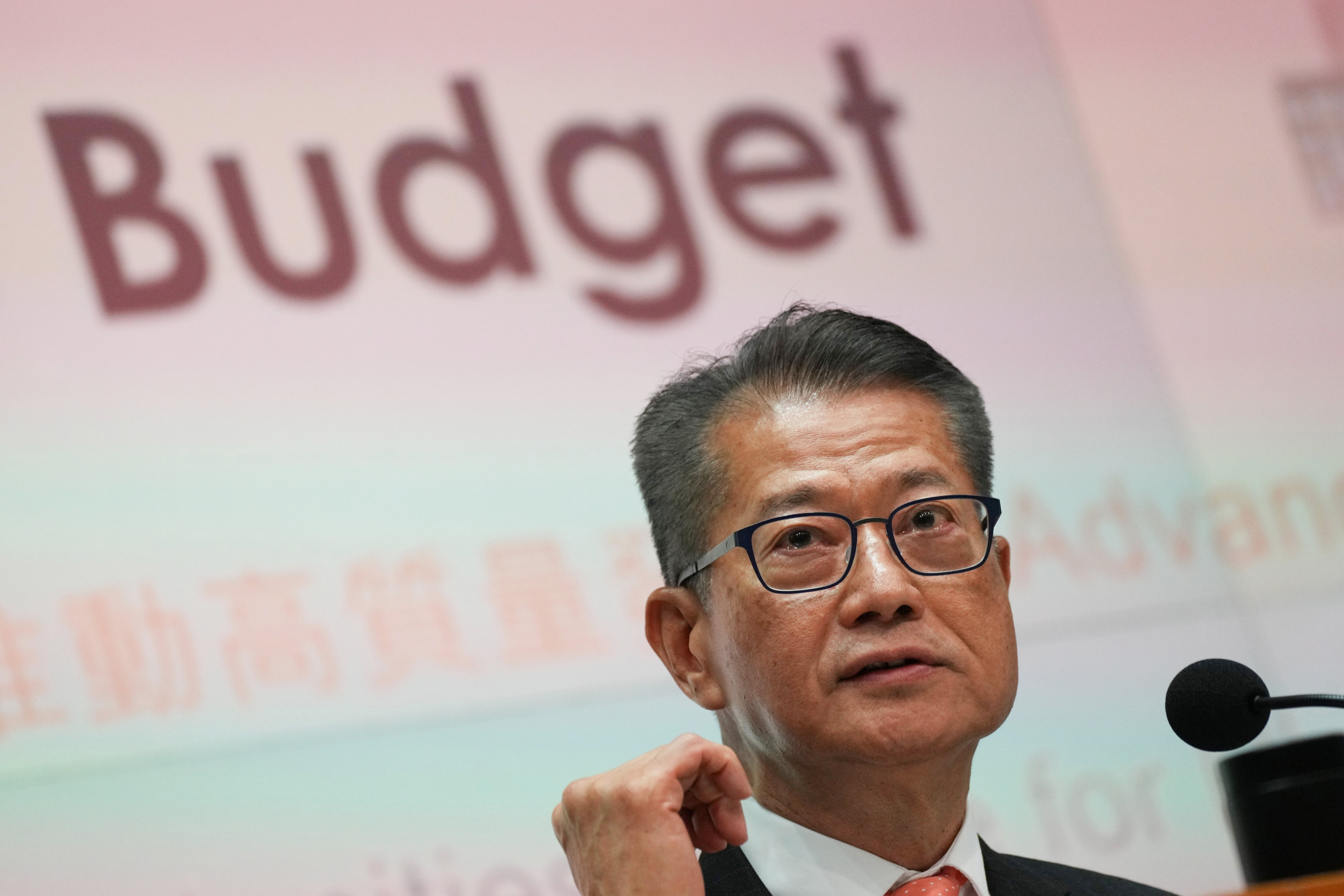Financial Secretary Paul Chan Mo-po attends a press conference for the budget in Hong Kong on Tuesday. Photo: Elson Li