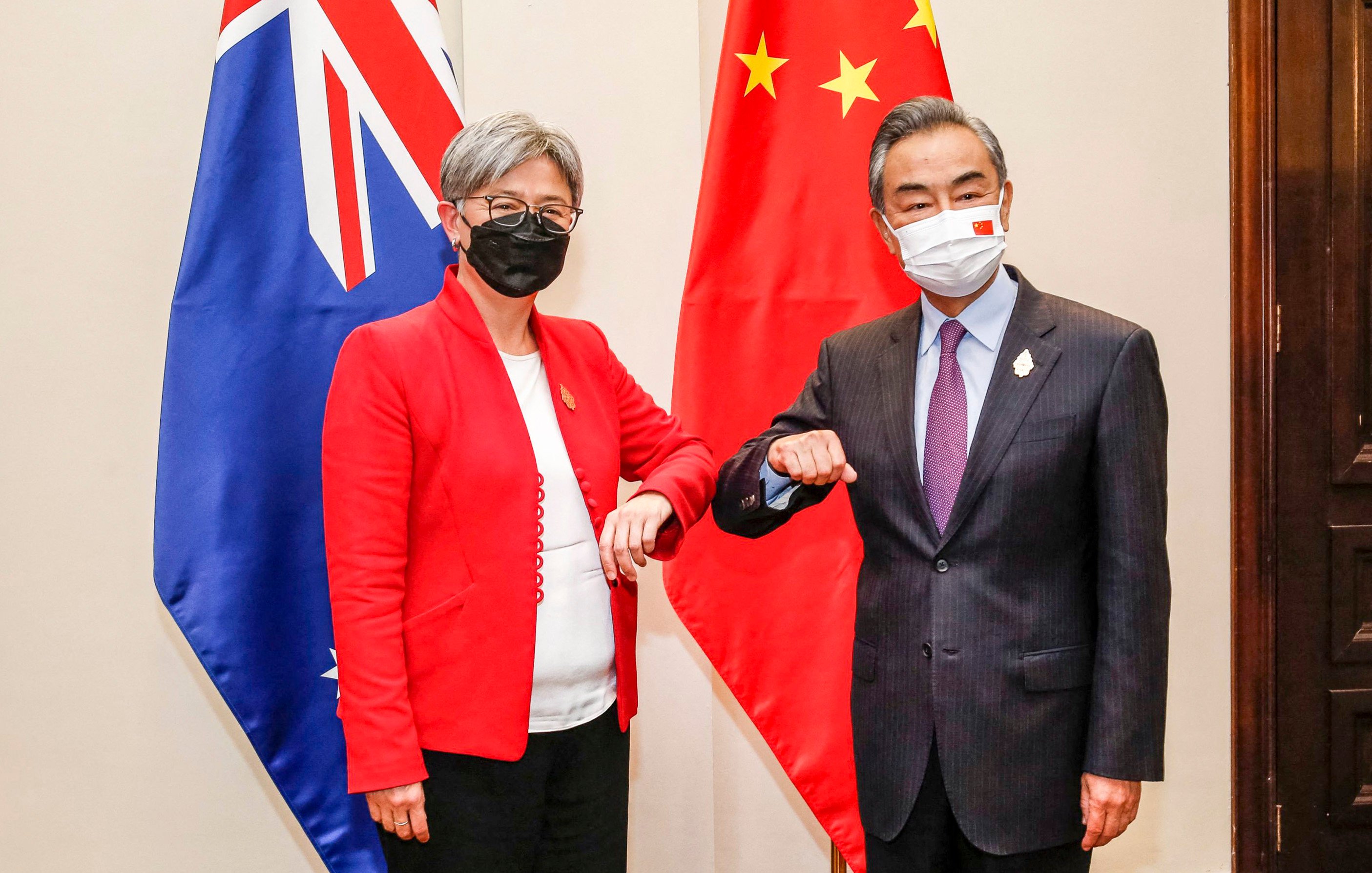 Australia’s foreign minister Penny Wong with Chinese counterpart Wang Yi in July 2022. Photo: AFP