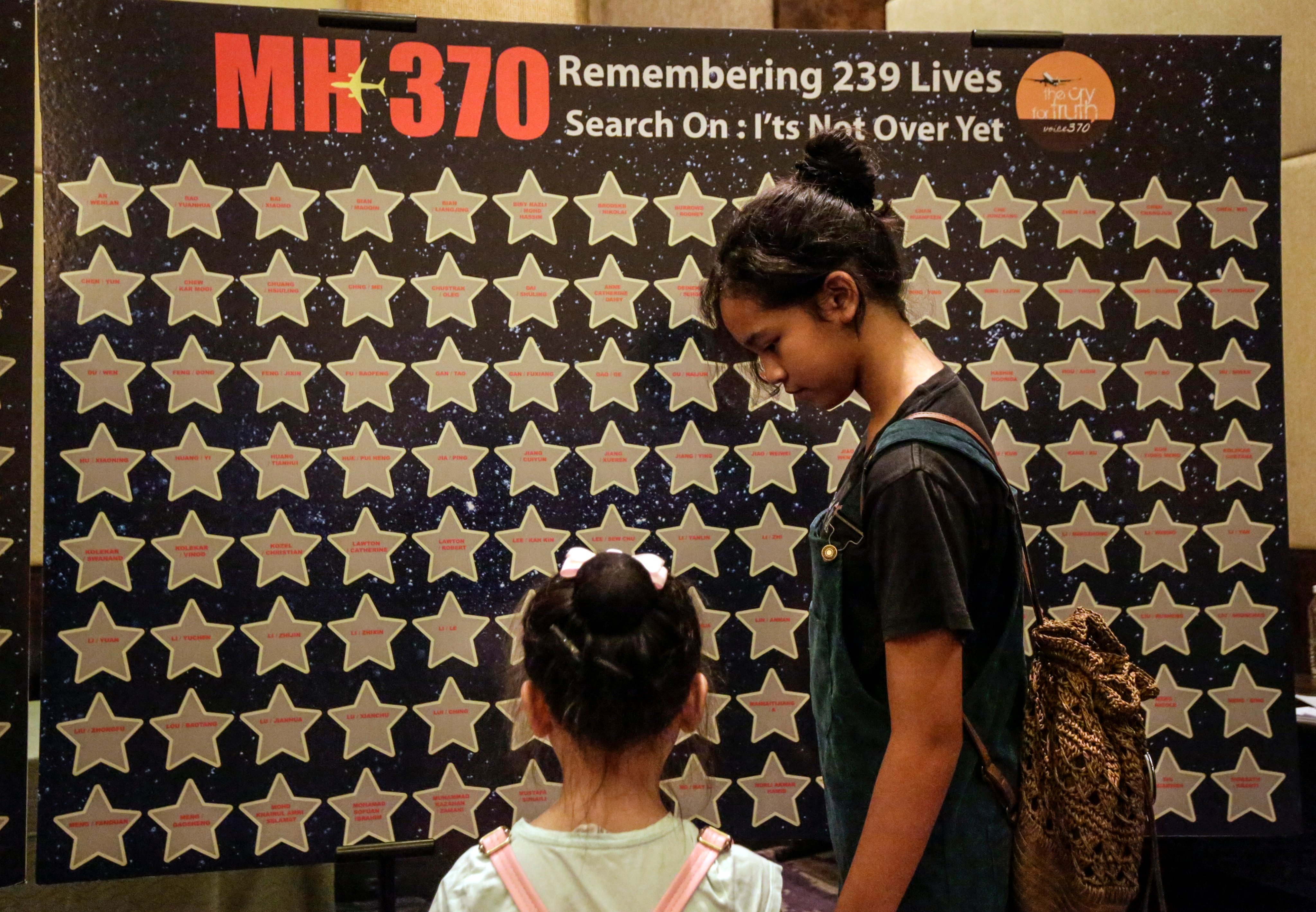 Relatives of missing MH370 passengers at a remembrance ceremony in Putrajaya, Malaysia, on March 7, 2020, to mark the sixth anniversary of the plane’s disappearance. The aircraft went missing on March 8, 2014. Photo: EPA-EFE