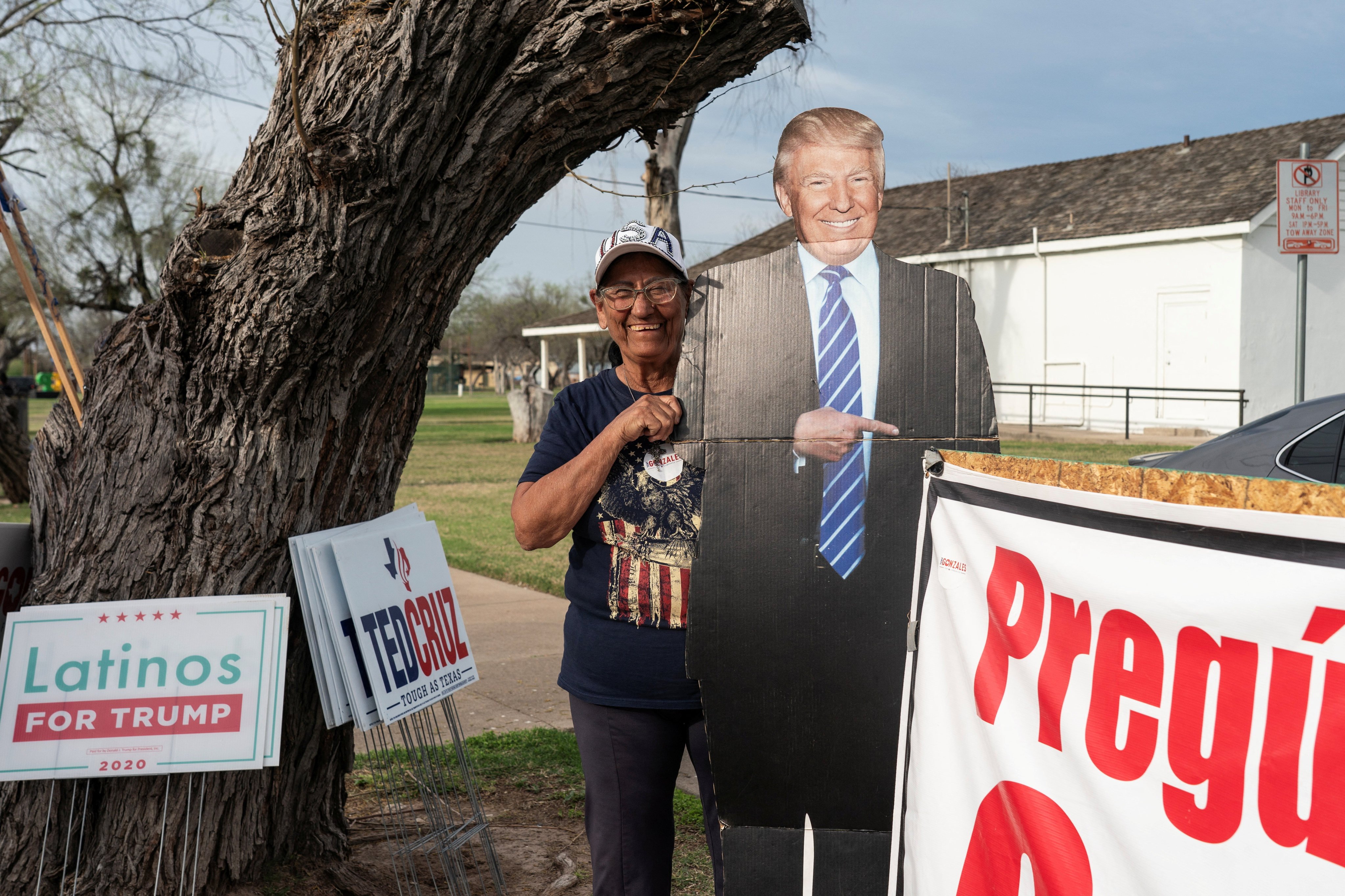 A Donald Trump supporter poses with a life-size cutout of the former US president in front of a polling station in Eagle Pass, Texas, on February 27. The United States is one of more than 60 countries holding national elections this year at a time when the democratic process is under unprecedented attack. Photo: Reuters