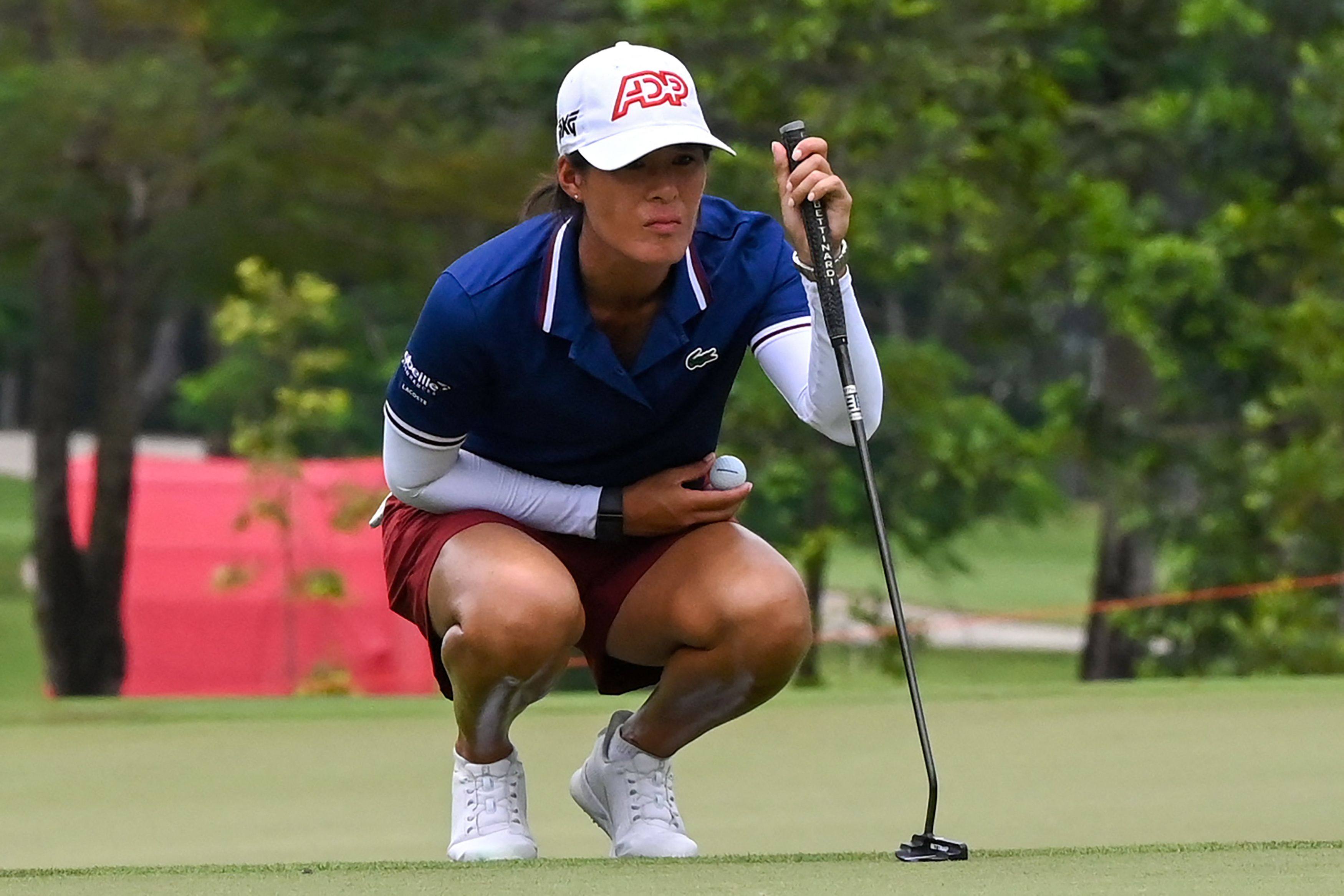 Celine Boutier of France lines up a putt during the second round of the HSBC Women’s World Championship at Sentosa Golf Club. Photo: AFP