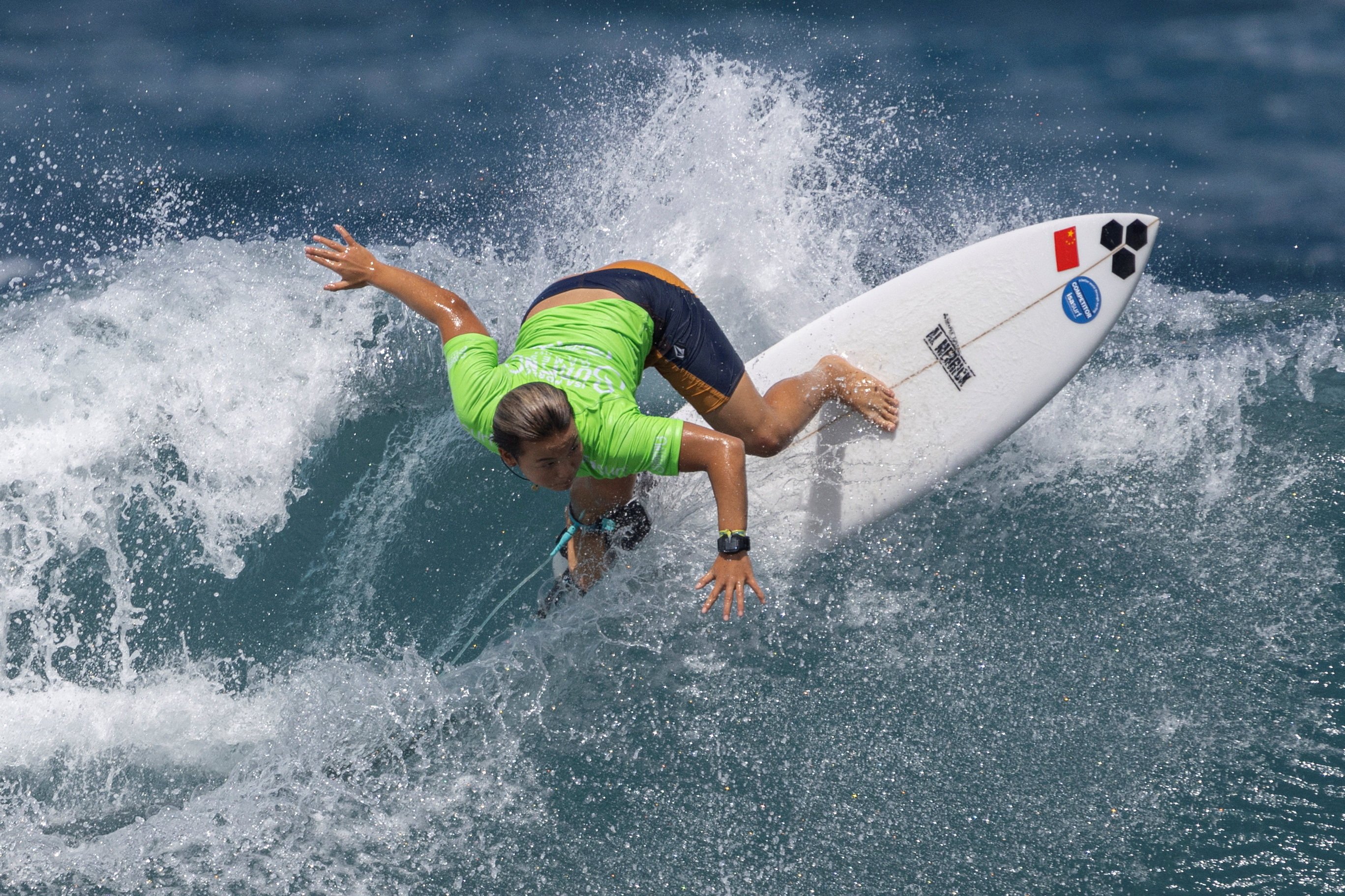 Yang Siqi on her way to an Olympic place at the World Surfing Games in Puerto Rico. Photo: Reuters