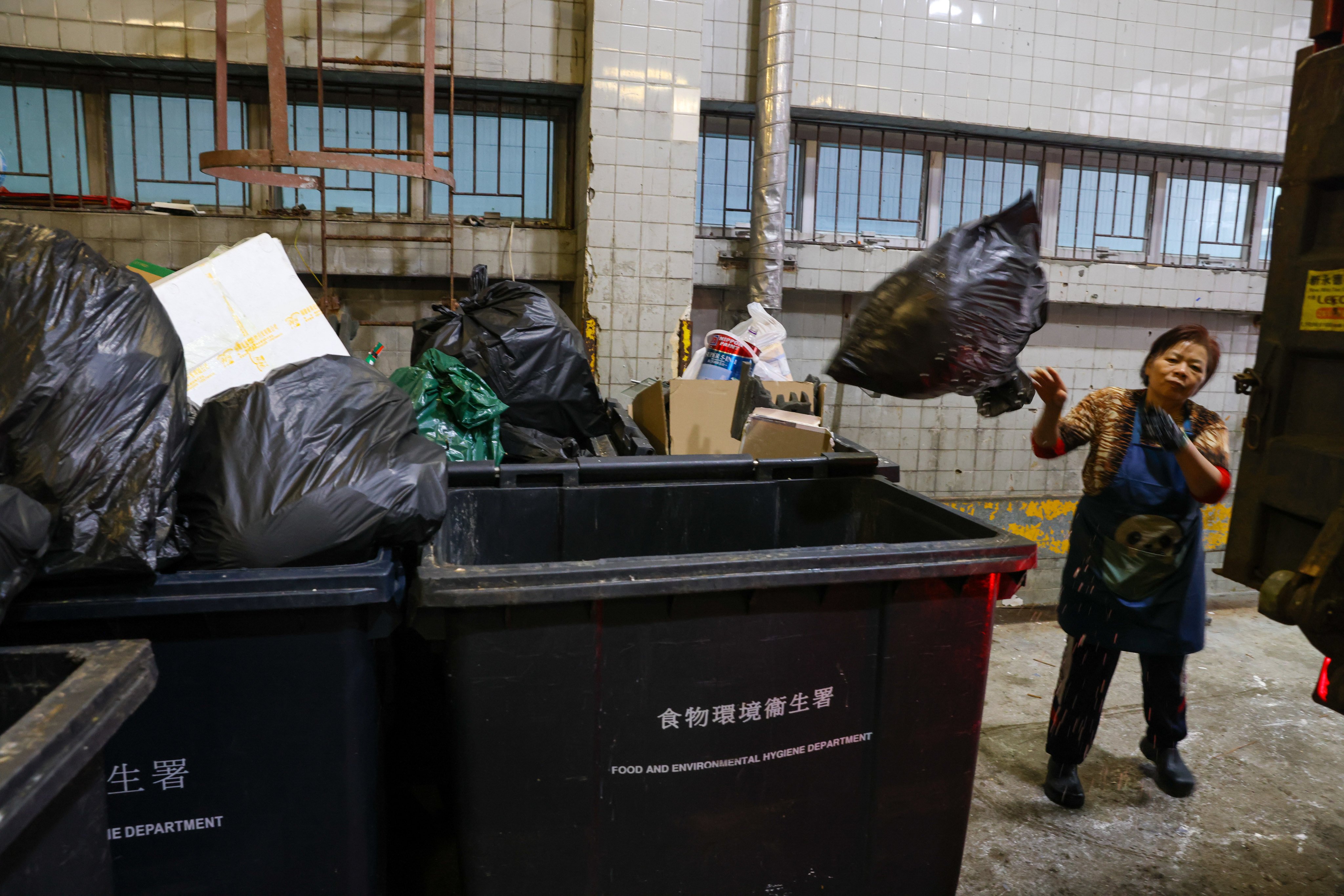 Household waste is collected at the Wing Hing Street Refuse Collection Point in Tin Hau. The waste charging scheme will take effect in August after being delayed from April. Photo: Yik Yeung-man