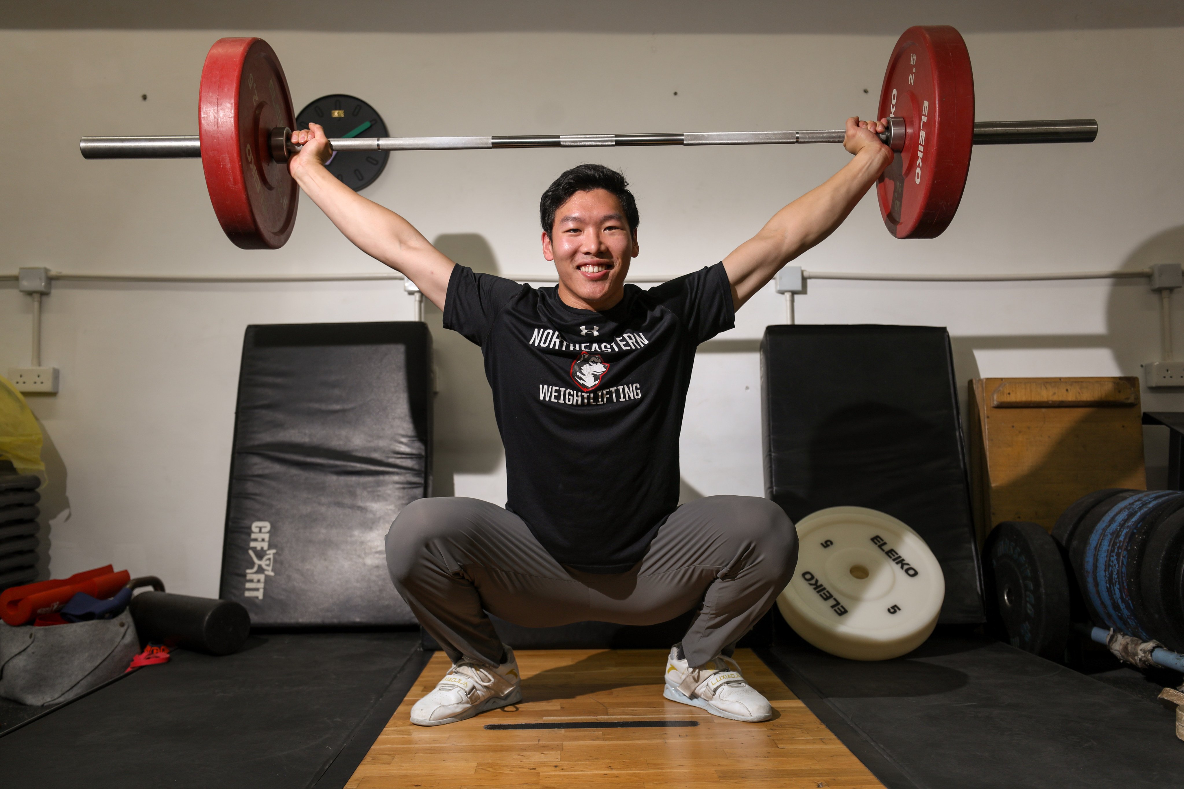 Weightlifter Matthew Tung at his coach’s modest gym in Wong Chuk Hang. Photo: Xiaomei Chen